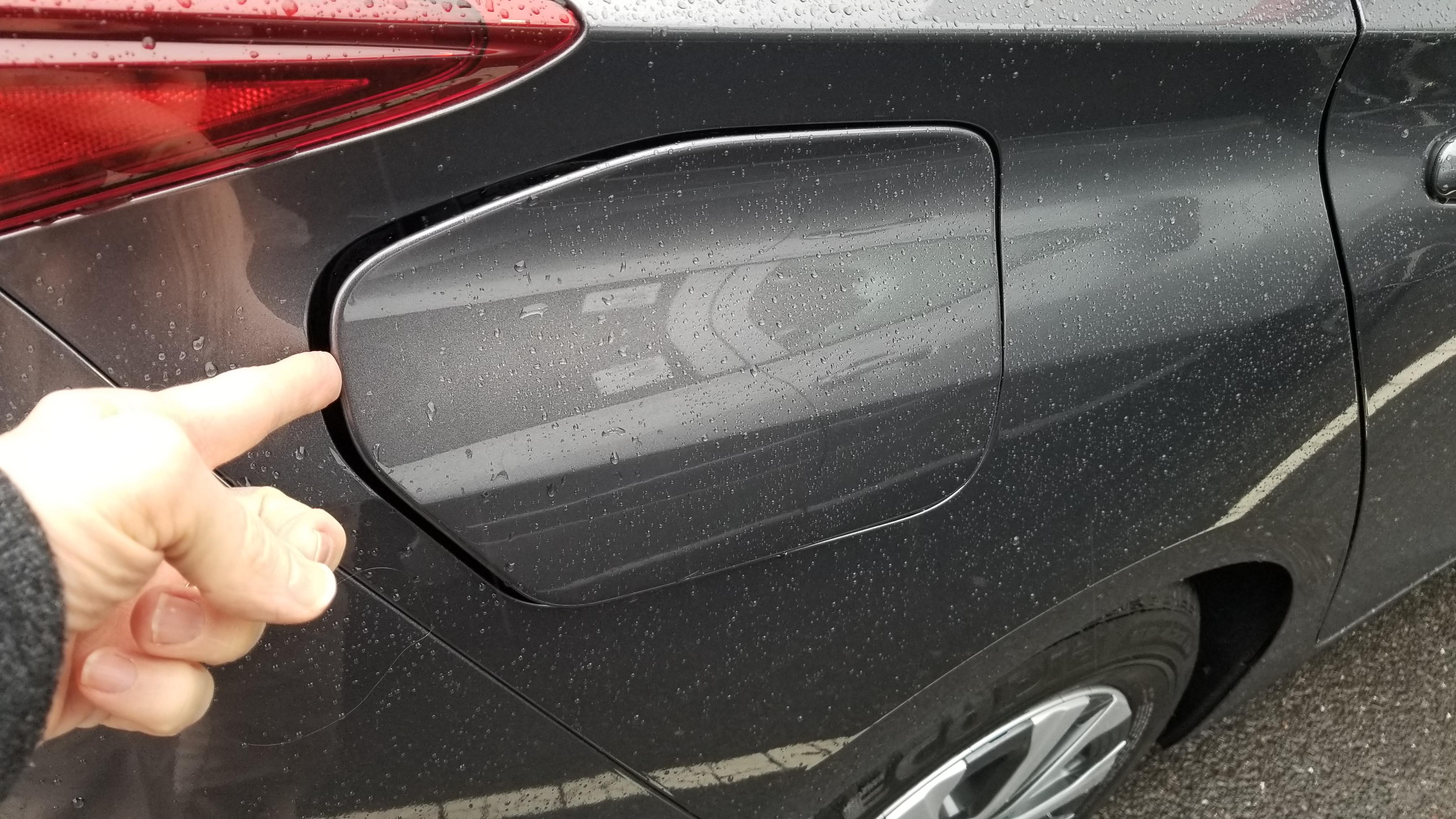 Help! My Prius Prime's charging port door is stuck partially open