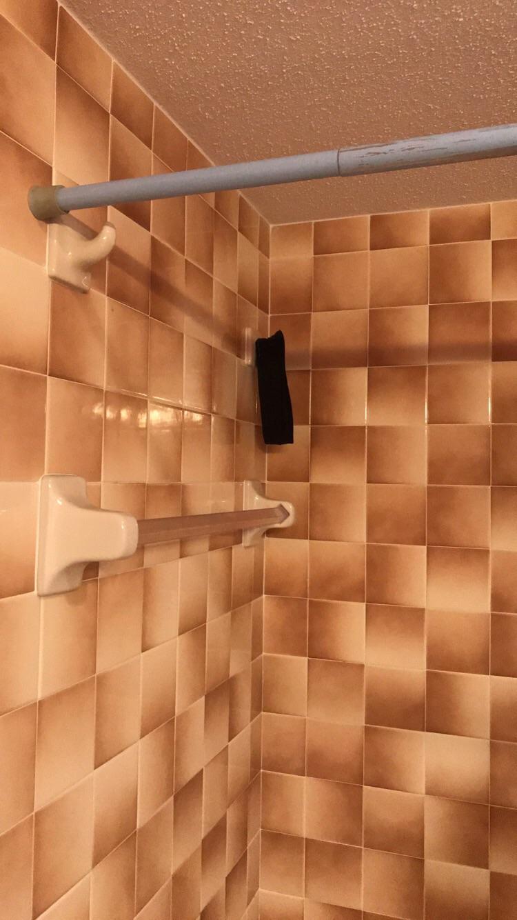 My bathroom has a towel rack and two hooks INSIDE the shower. As well