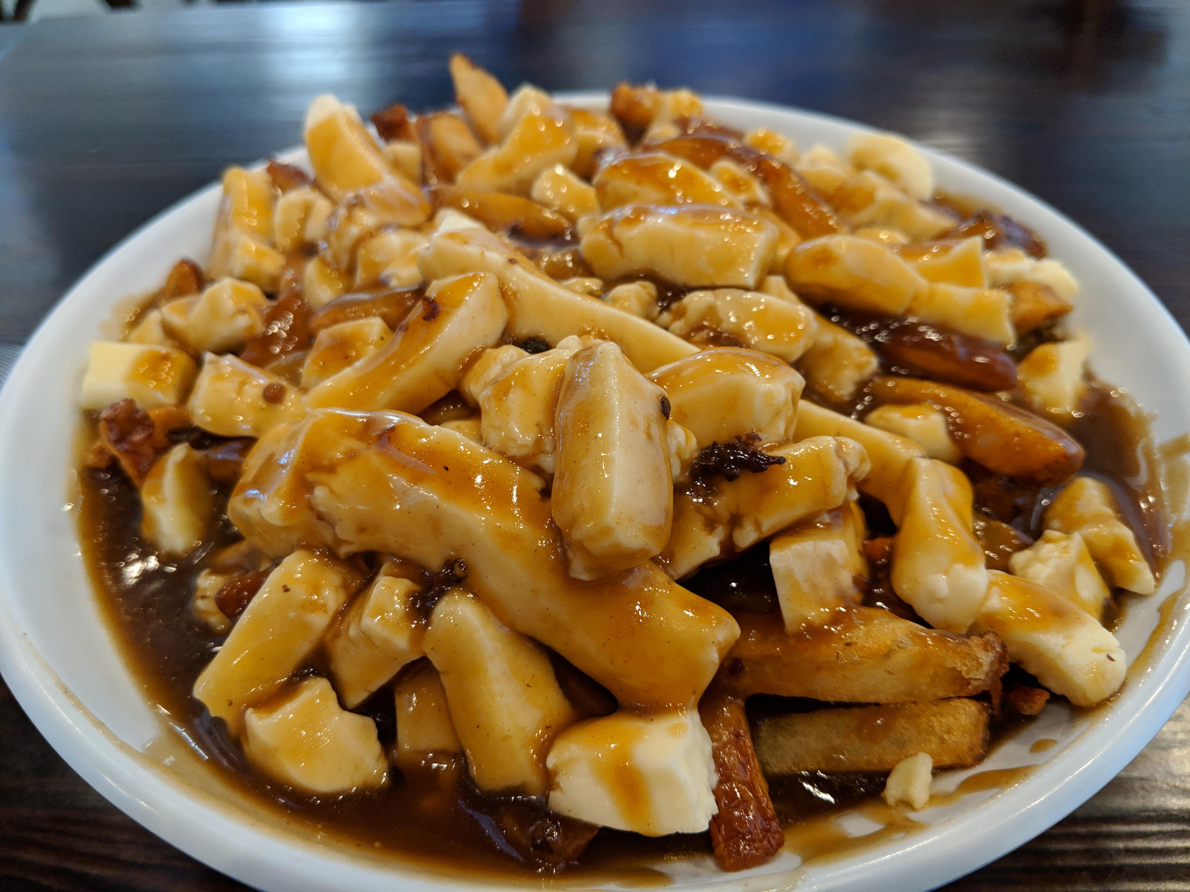 Classic Poutine Kennebec fries, St Hubert gravy, local cheese curds