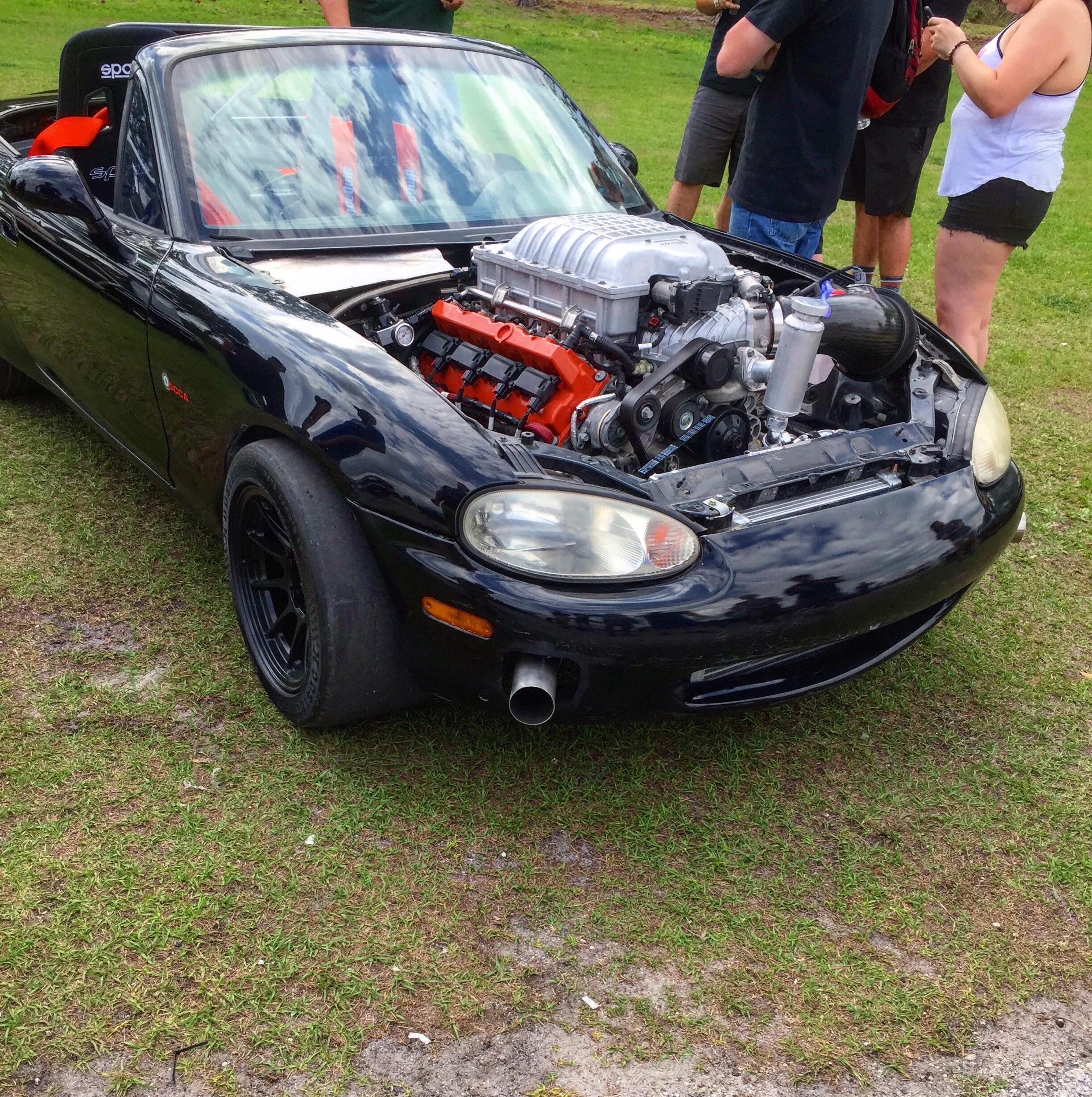 Modified convertible Miata with the exhaust in the front r/CrappyDesign