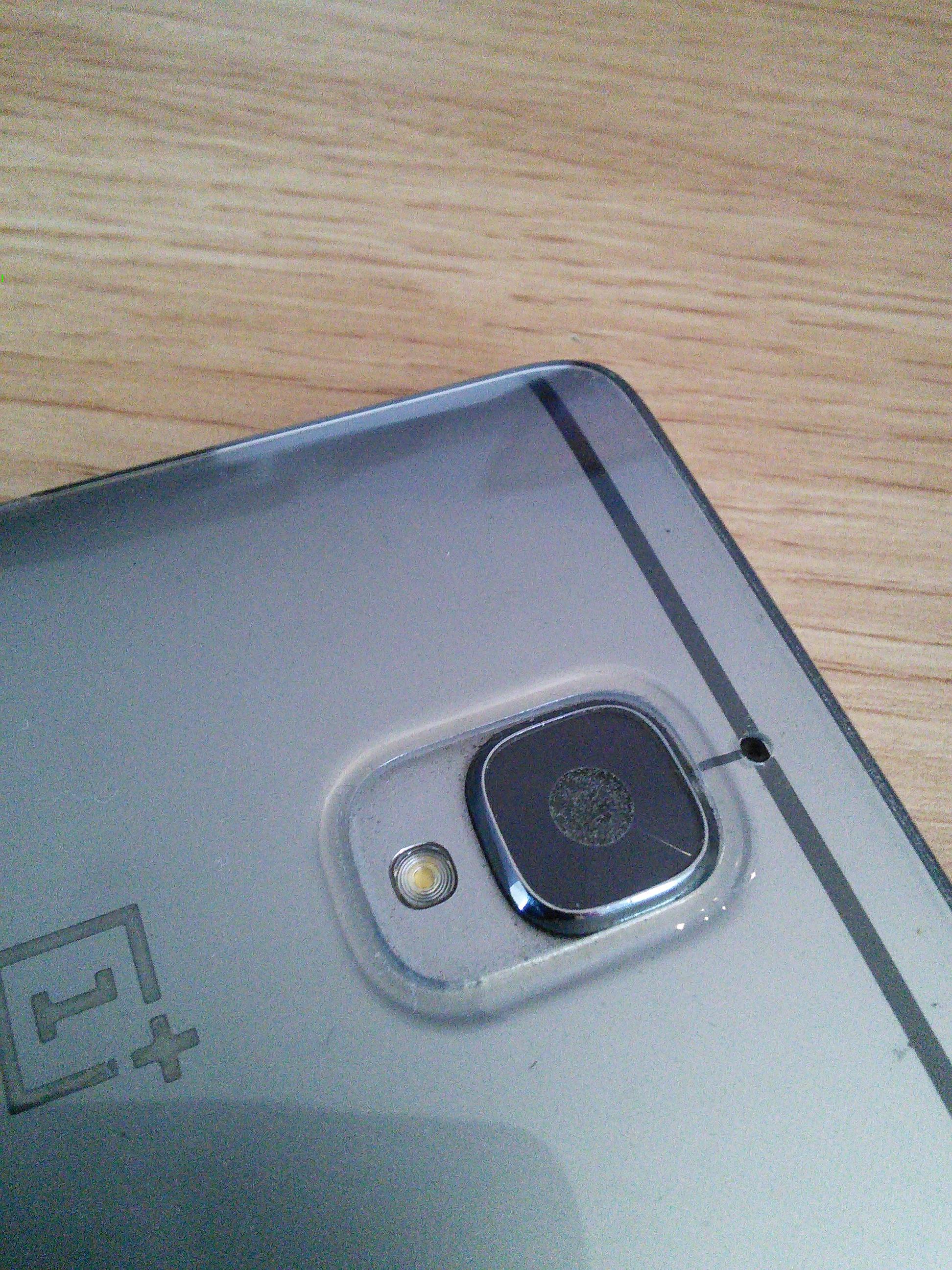 Dust under Camera glass after screen repair! r/oneplus