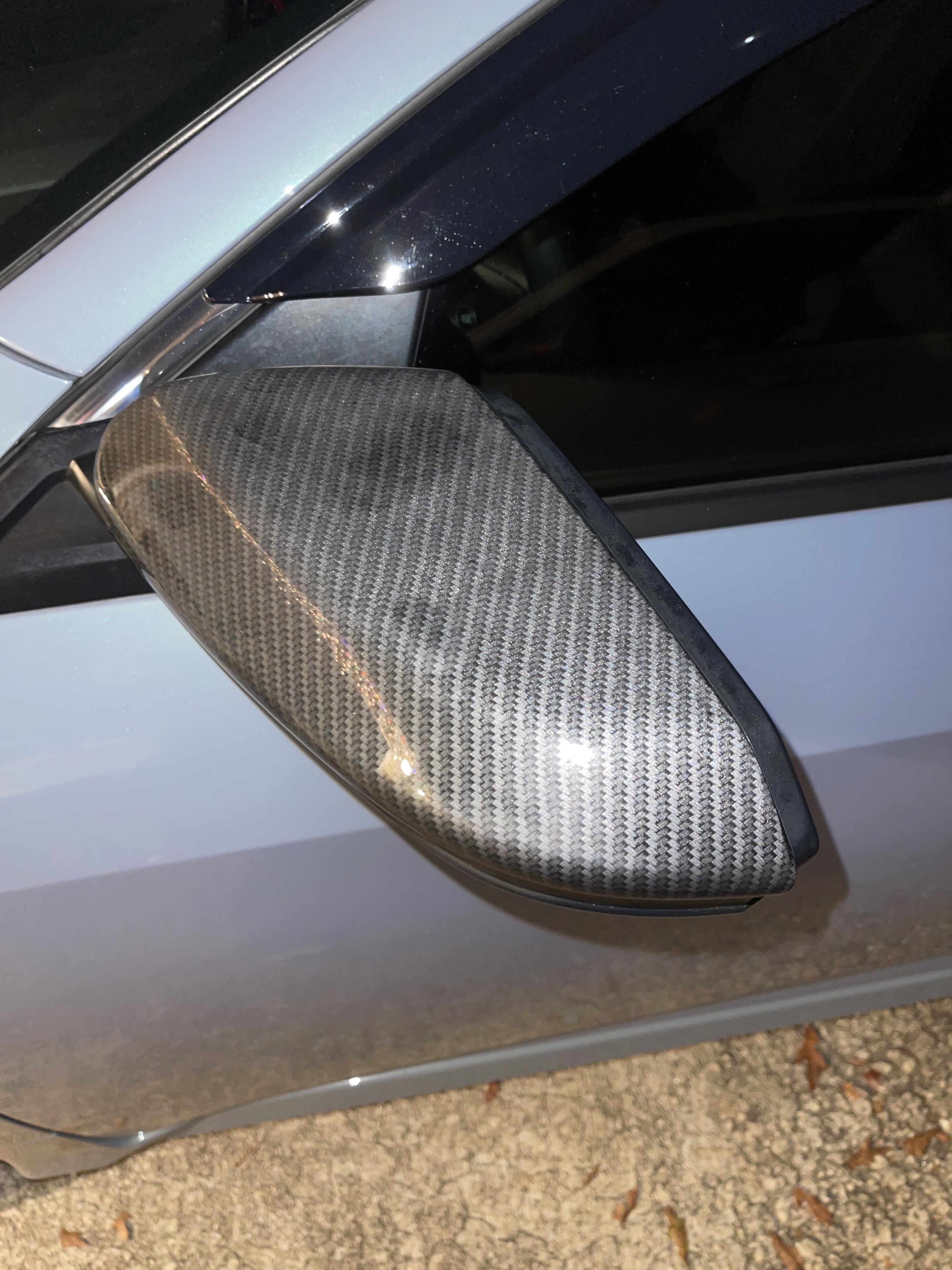 Anyone know how to remove these aftermarket mirror caps? The previous