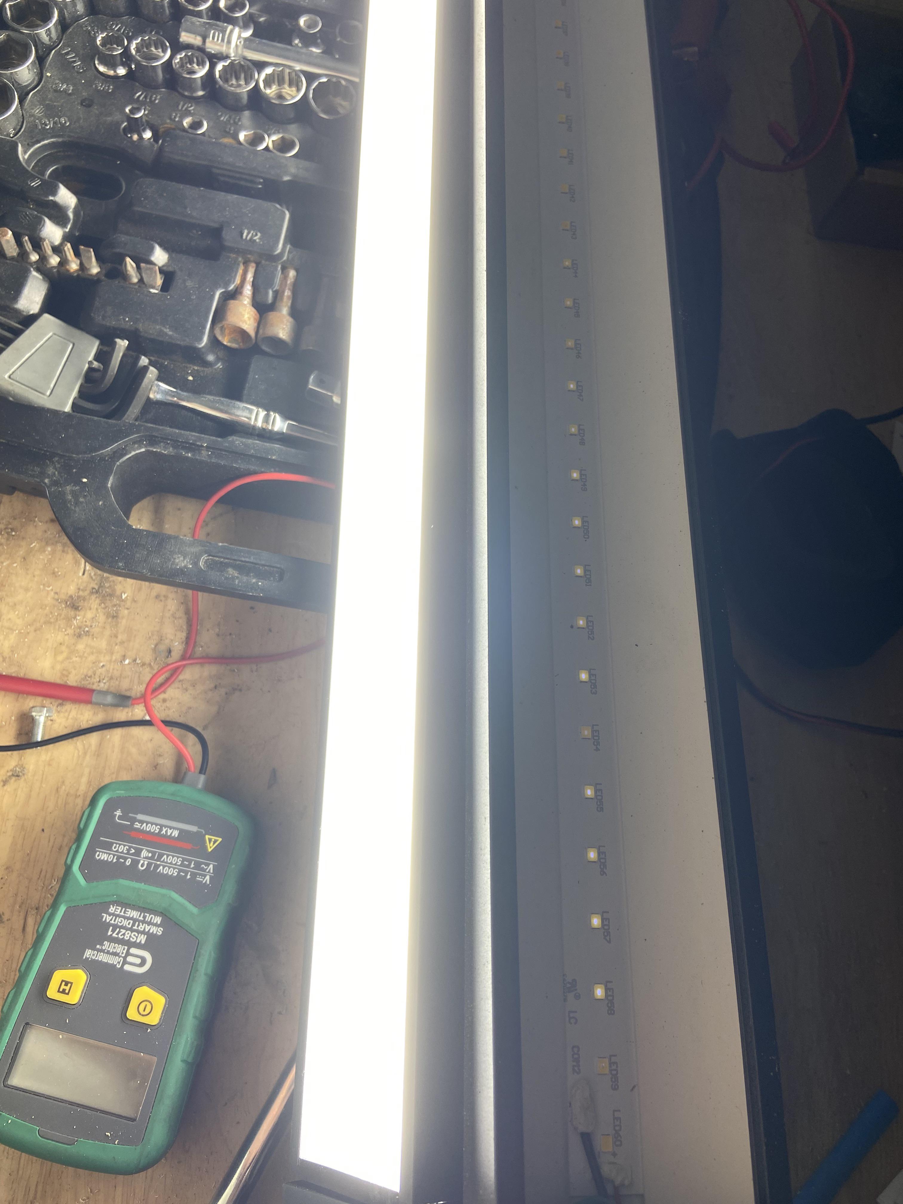 Commercial electric LED shop light trouble. r/fixit