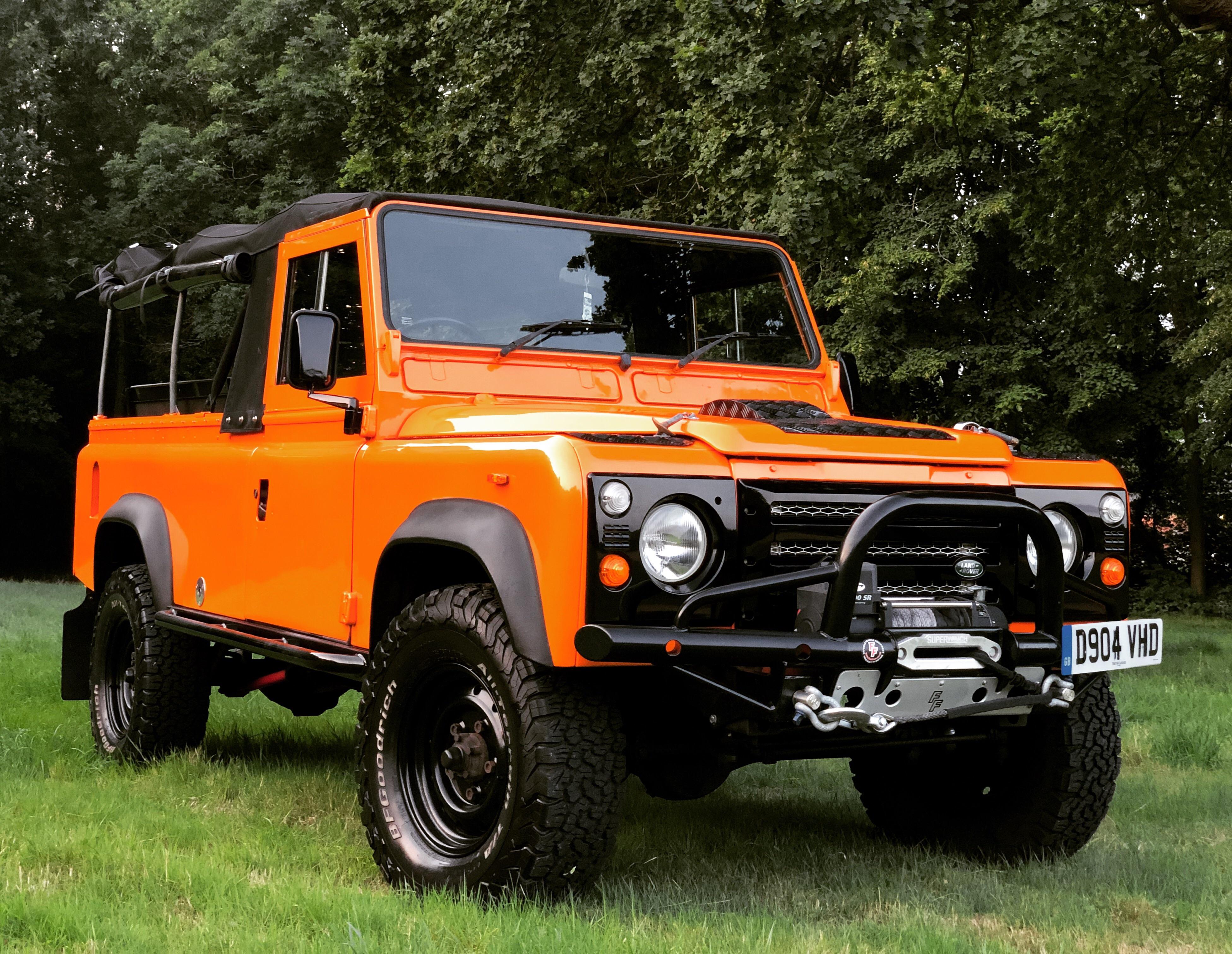 1987 fully restored Ford Orange Land Rover Defender 110 D110 convertible. 200tdi with uprated