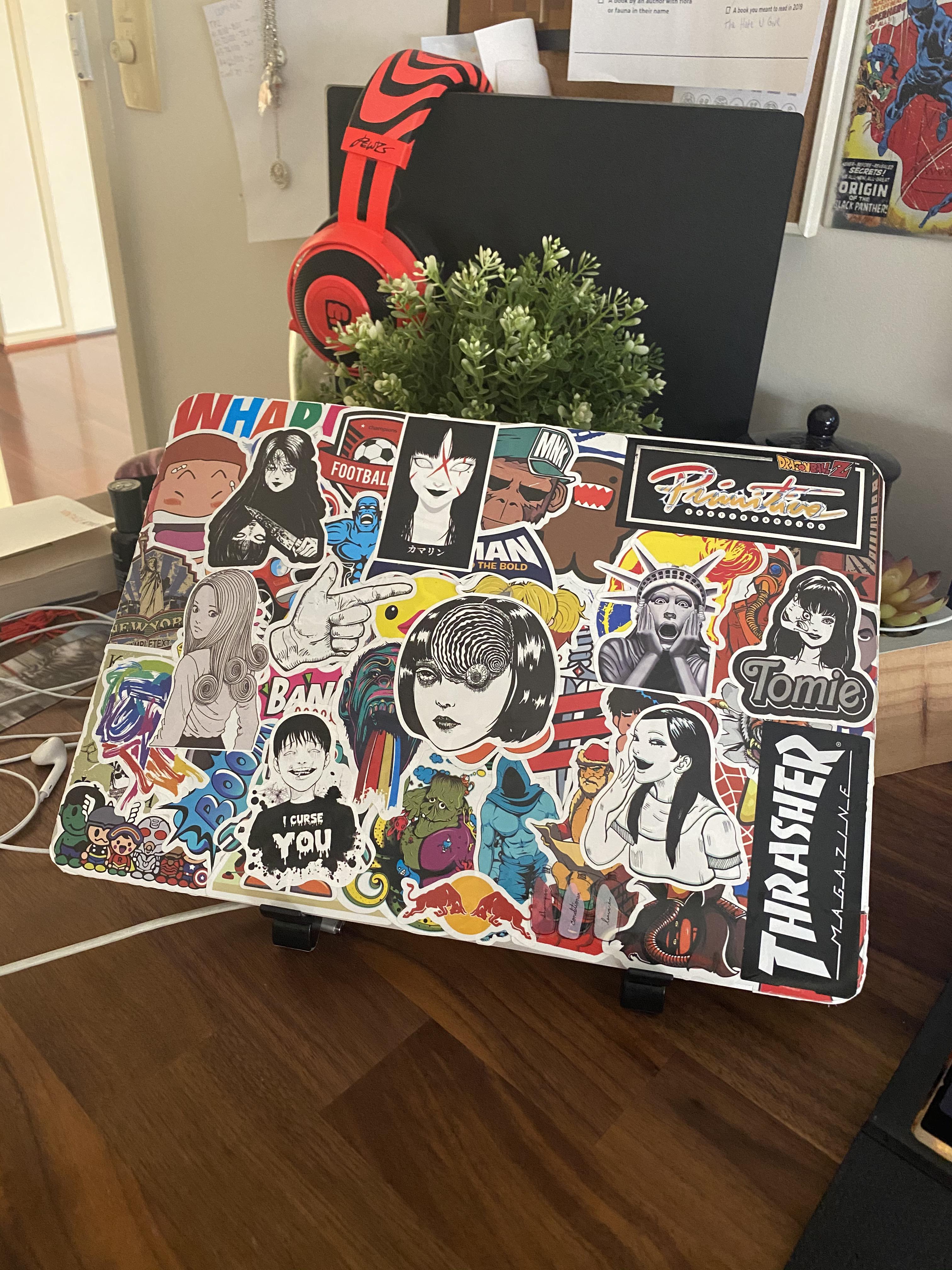 Sticker bombed my laptop, i want to cover up some of the stickers soon
