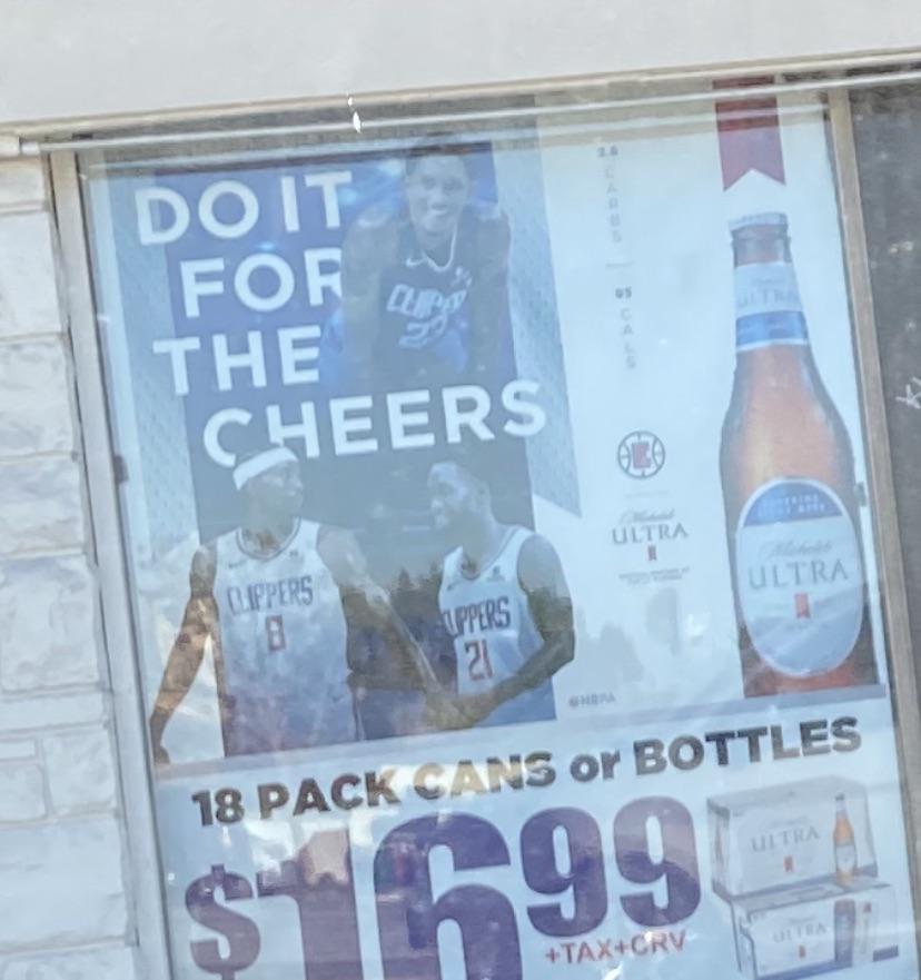 Old clippers ad with Lou Will and Bev still up on a gas station near me
