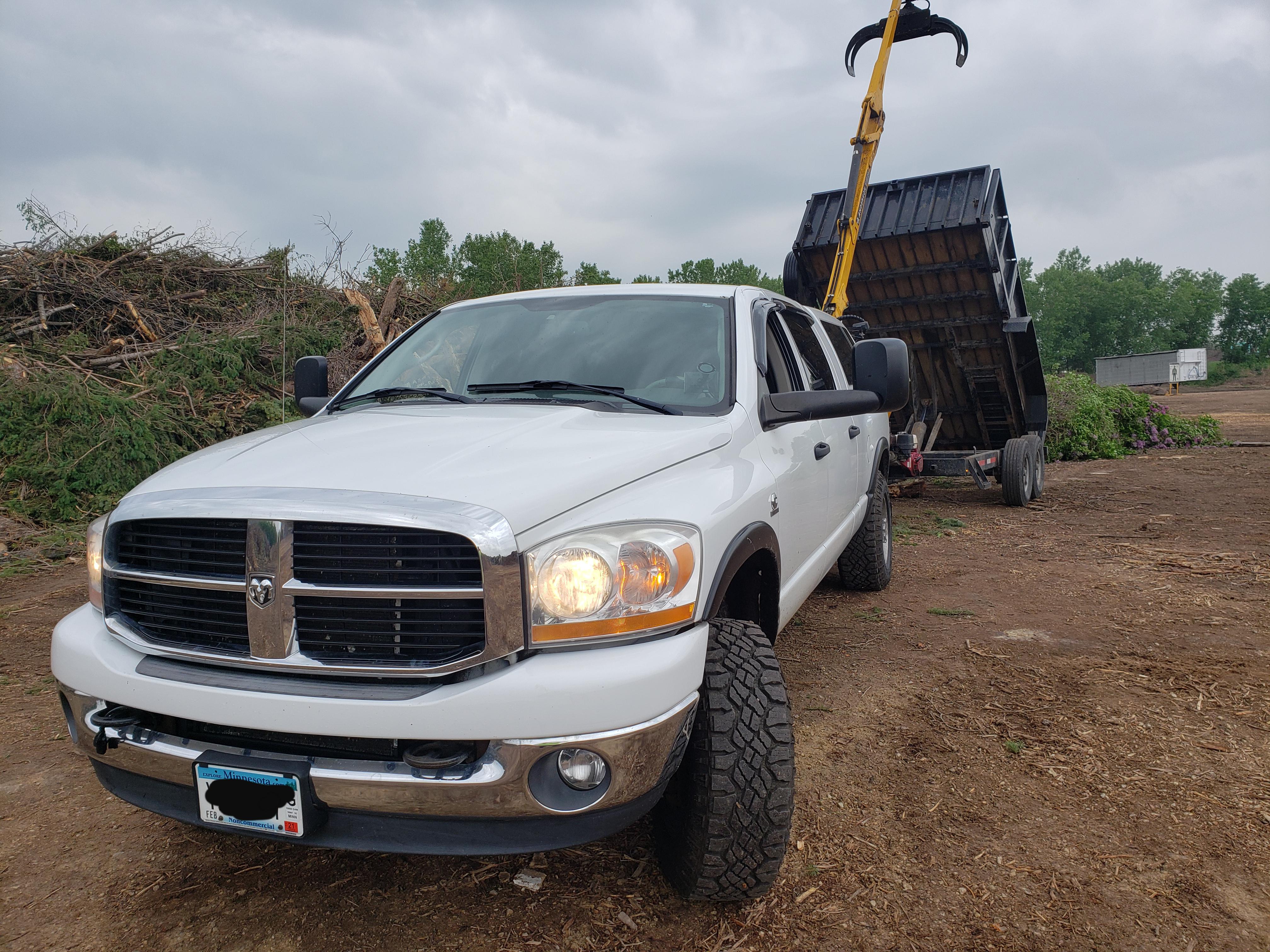 2006 3500 Mega, hauling logs with a grapple/dump trailer r/Diesel