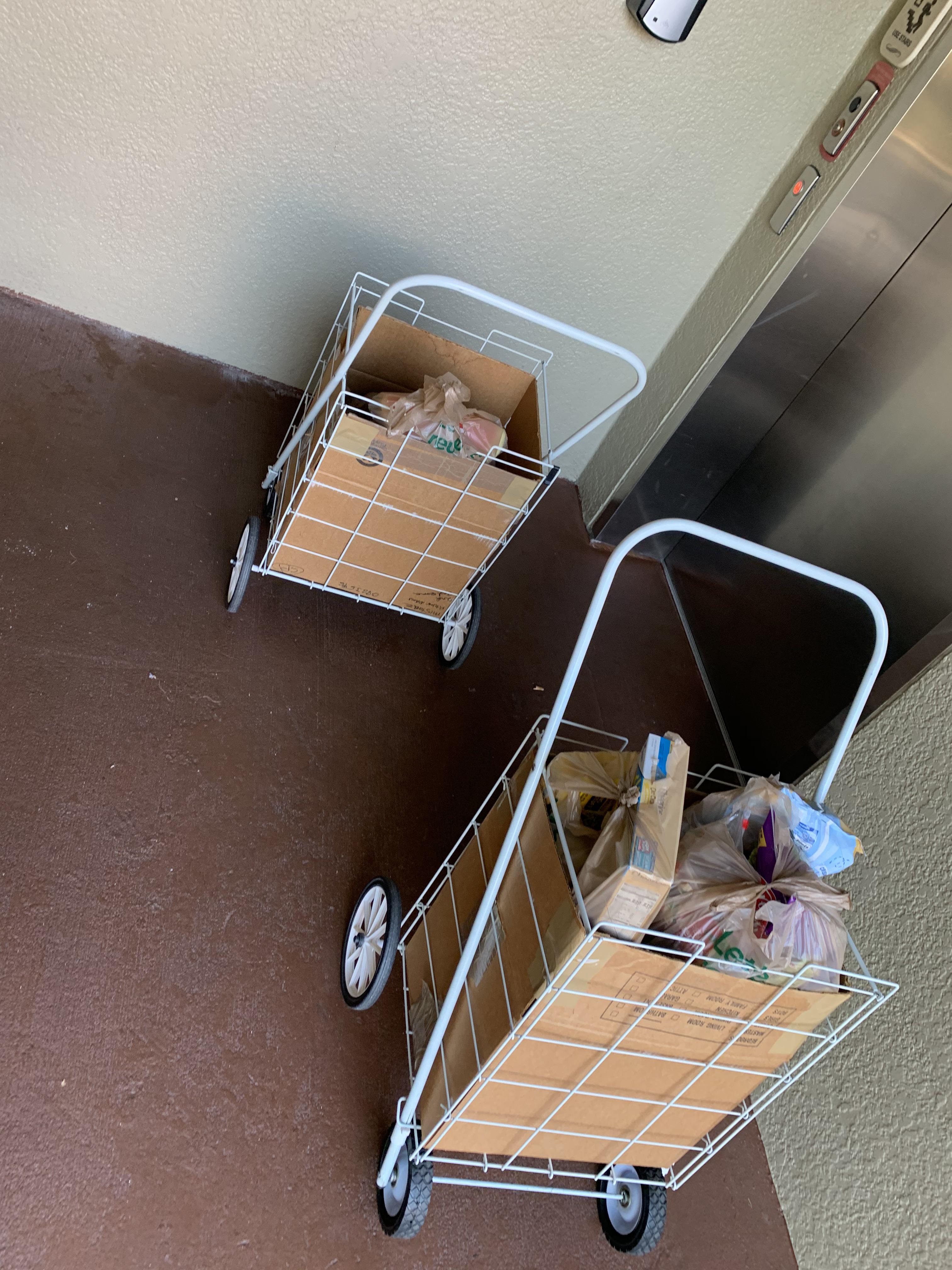 53 ORDER CUSTOMER HAD TWO CARTS TO CARRY THE GROCERIES UPSTAIRS . Very