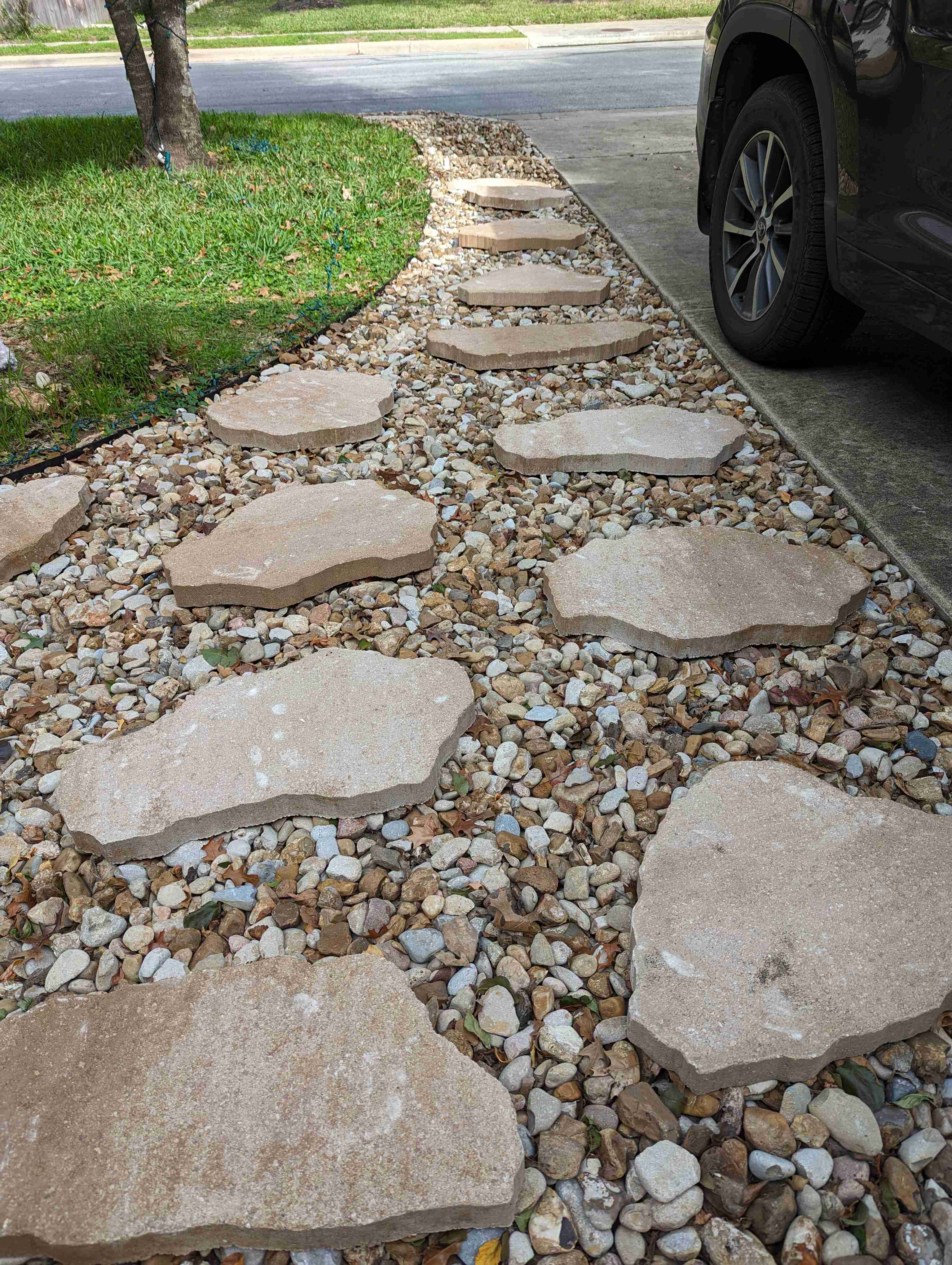 add stepping stones to existing river rock bed r/landscaping