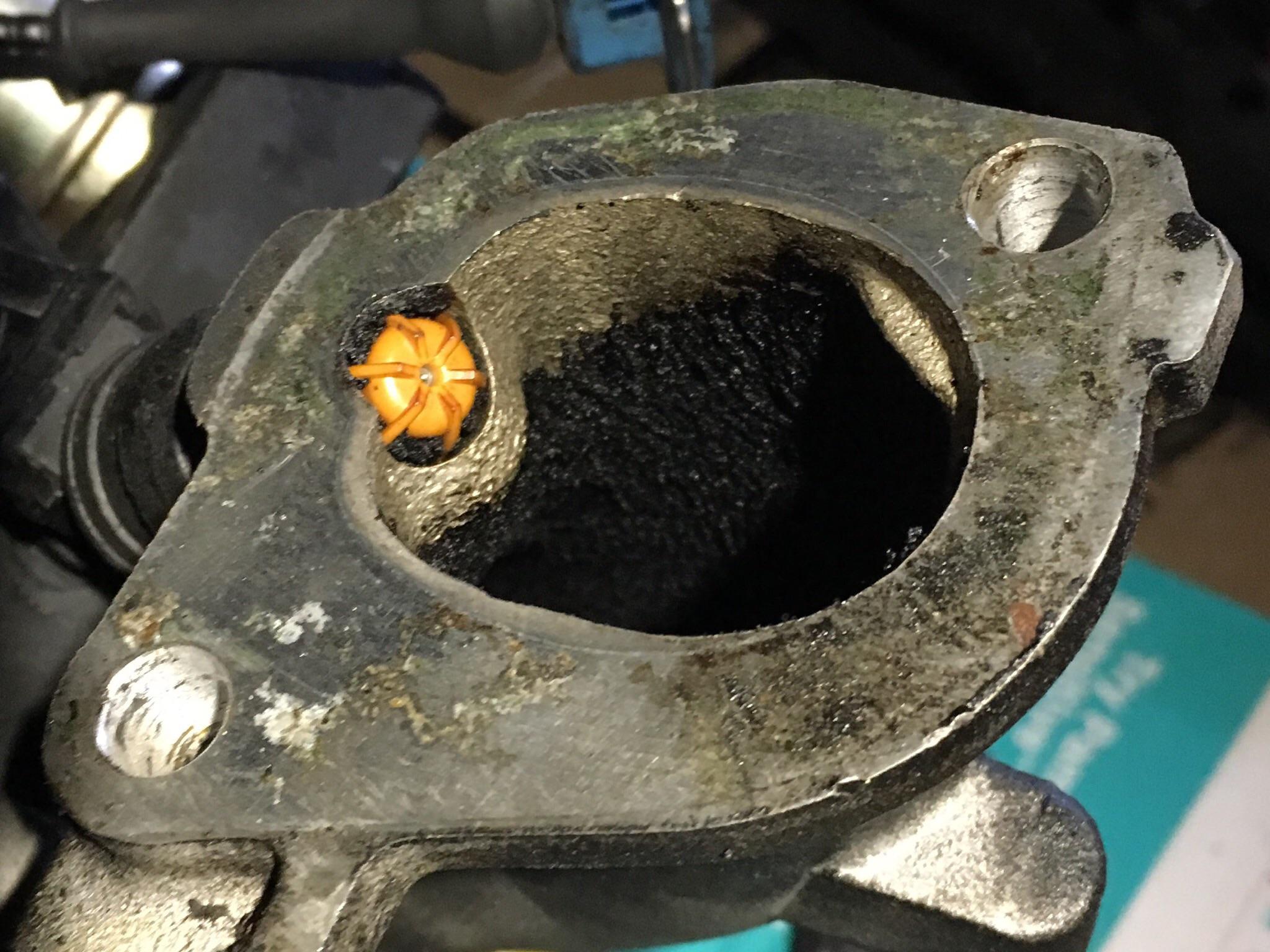 Intake manifold walls filled lined with oil/sludge r/MechanicAdvice