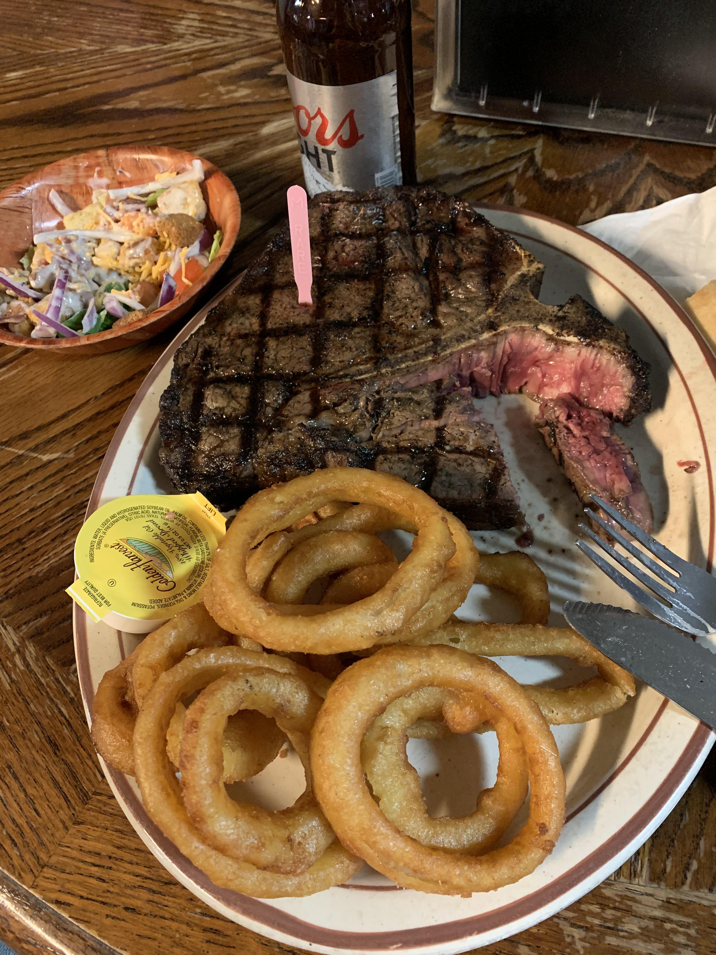 A stupidly large (and tender) Porterhouse done medium rare and wood