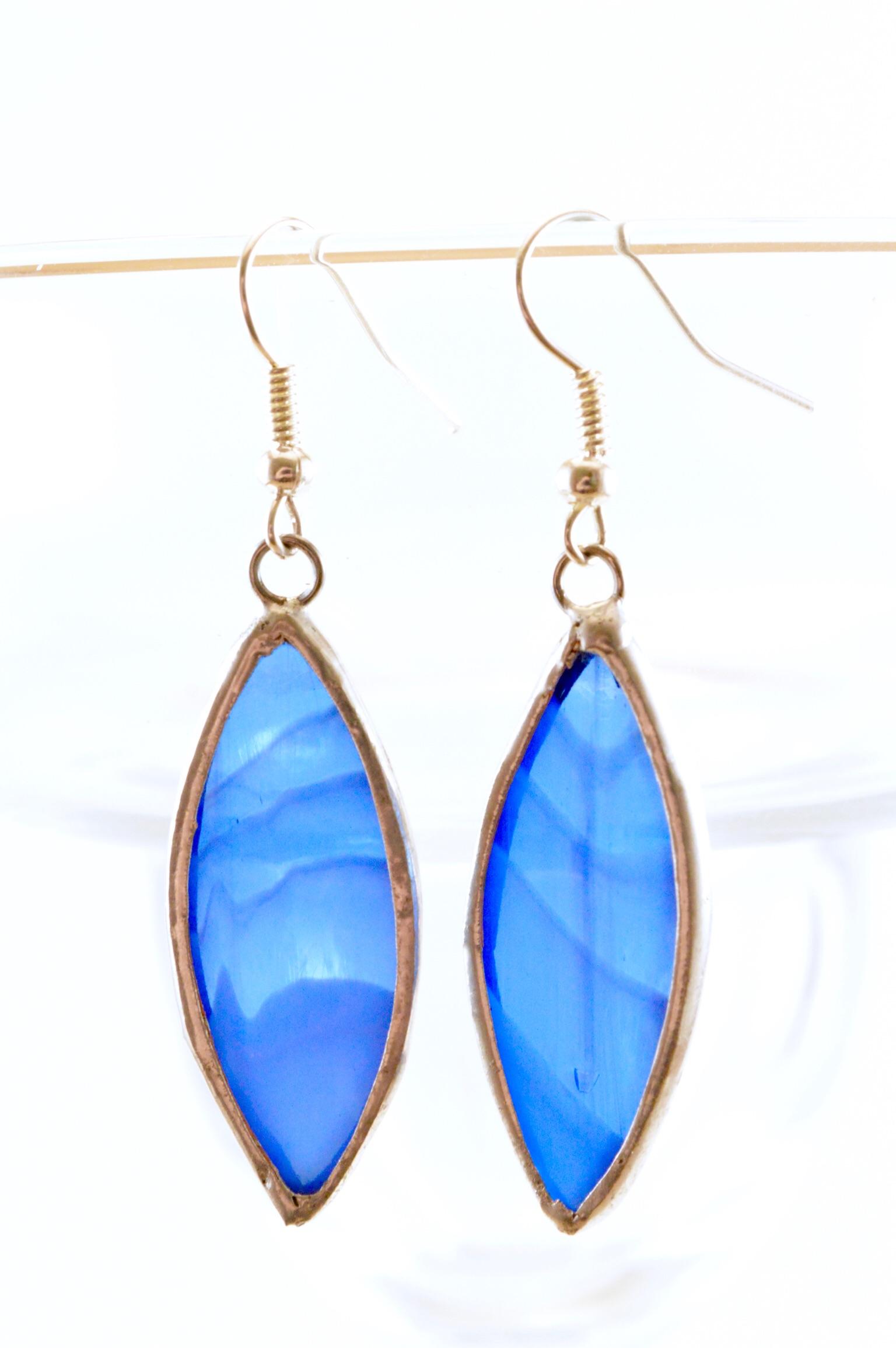 Some stained glass earrings I made. They remind me ever so slightly of peacock feathers! r