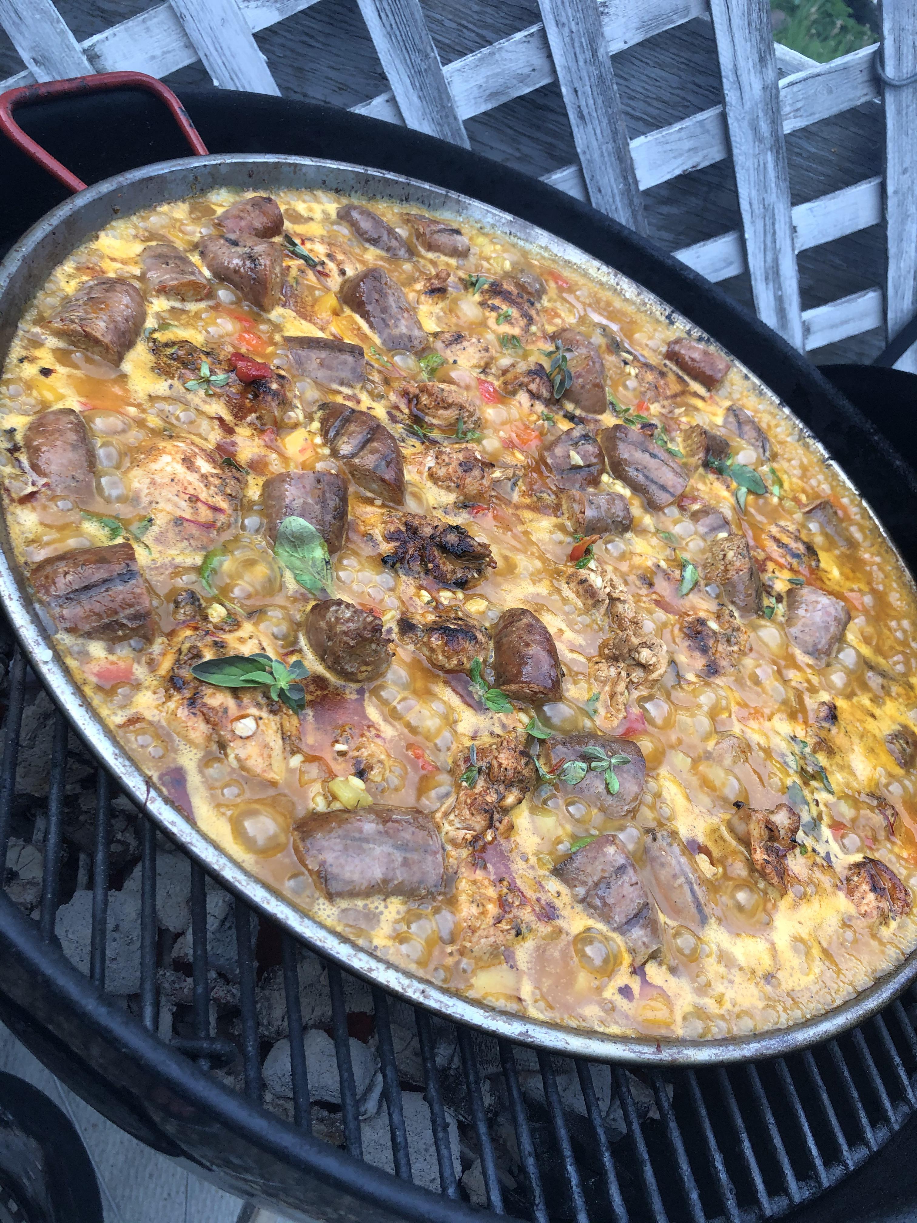 Paella on the er Kettle. Followed (for the most part) Adam Perry