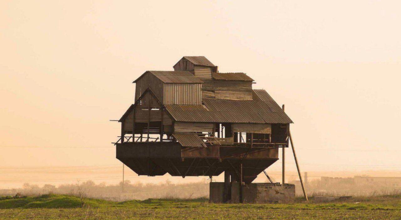 Abandoned potato sorting shed in Ukraine seems to be floating but in