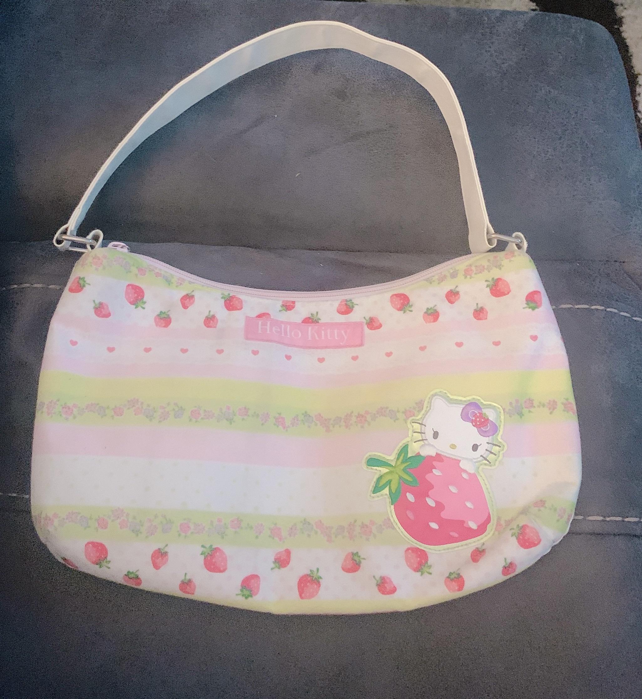 look at this hello kitty bag I found at a vintage store! r