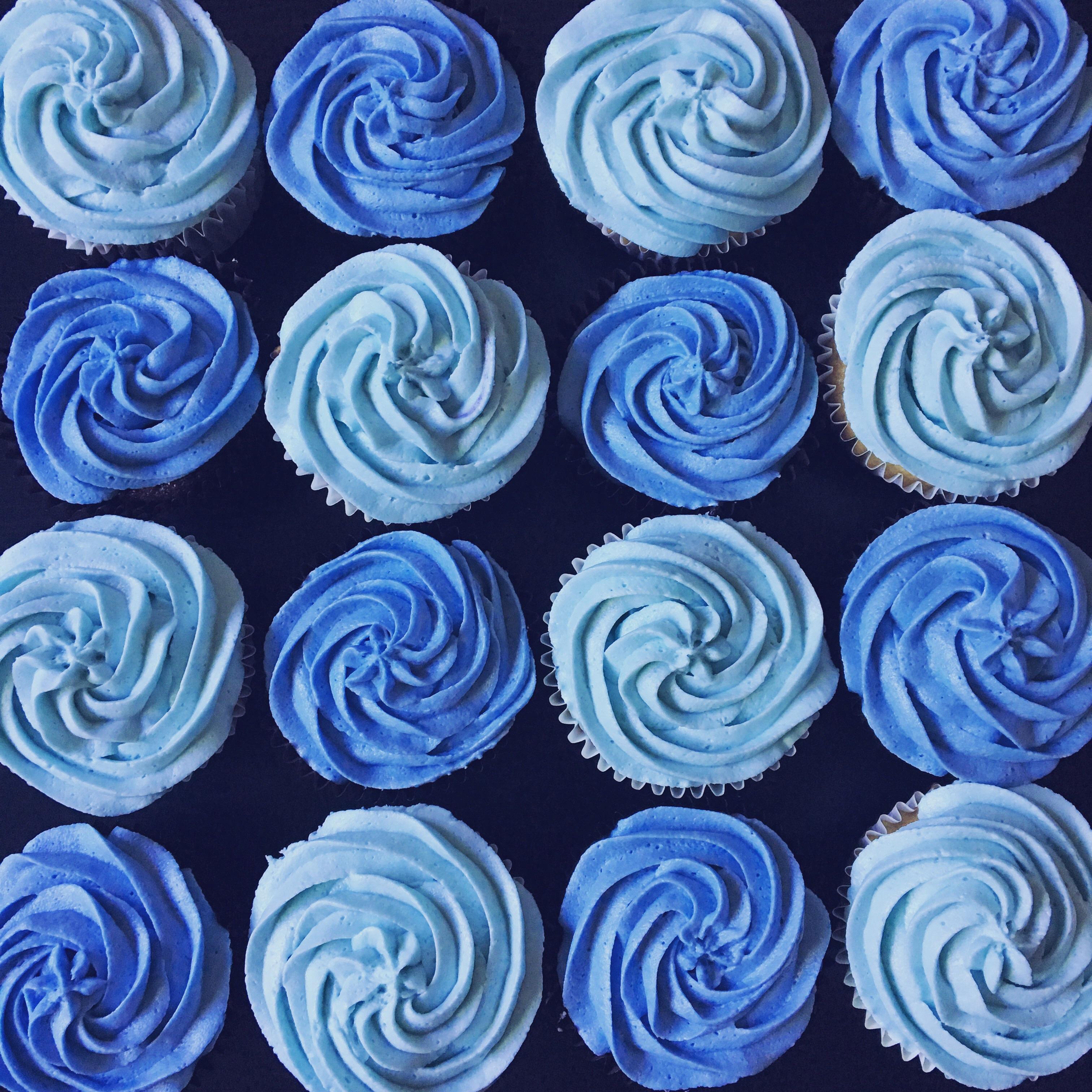 A sea of blue cakes for a diabetes awareness charity bake sale. r/Baking