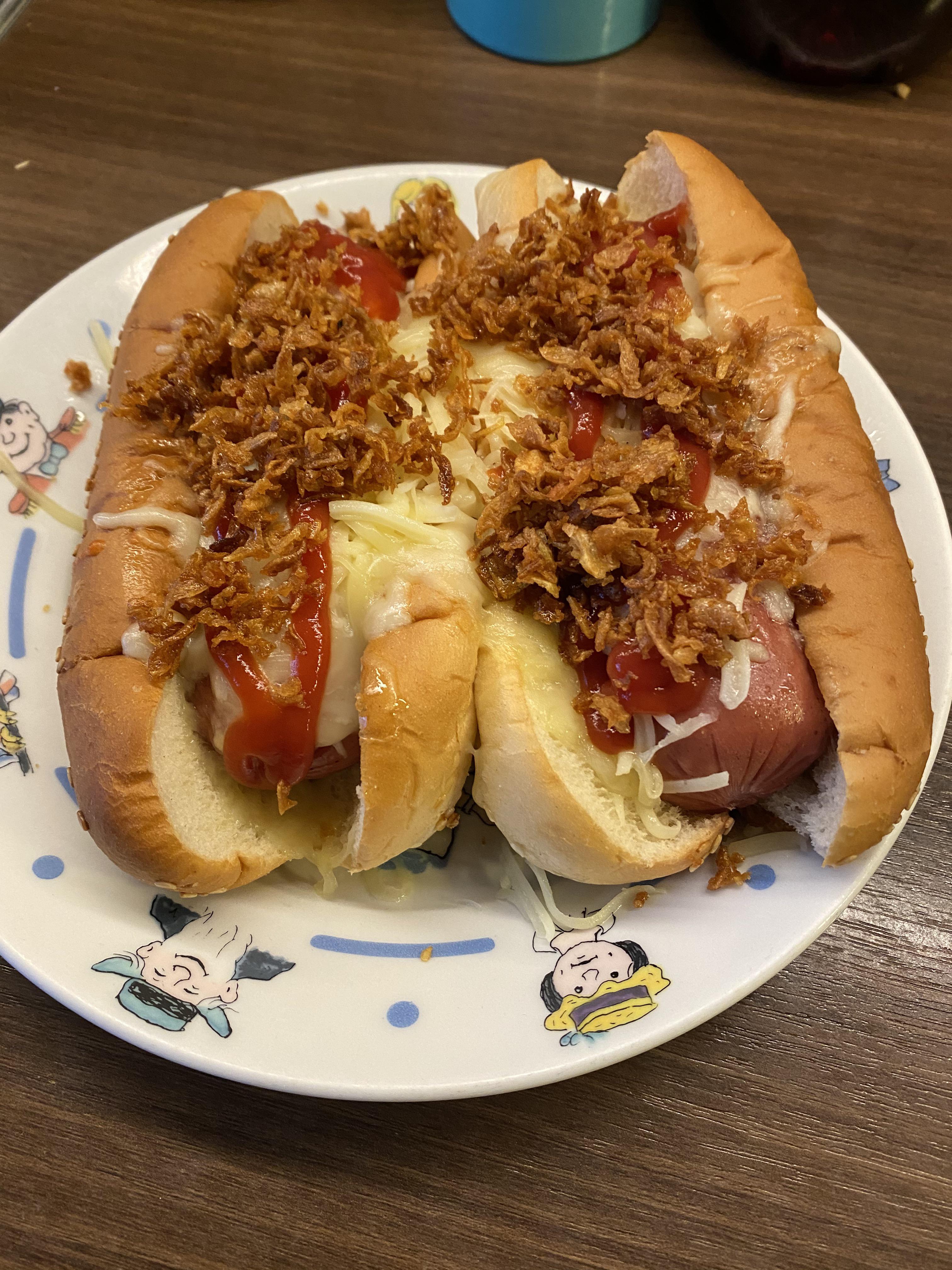 Microwaved chili cheese hotdogs with fried onion and extra cheese r