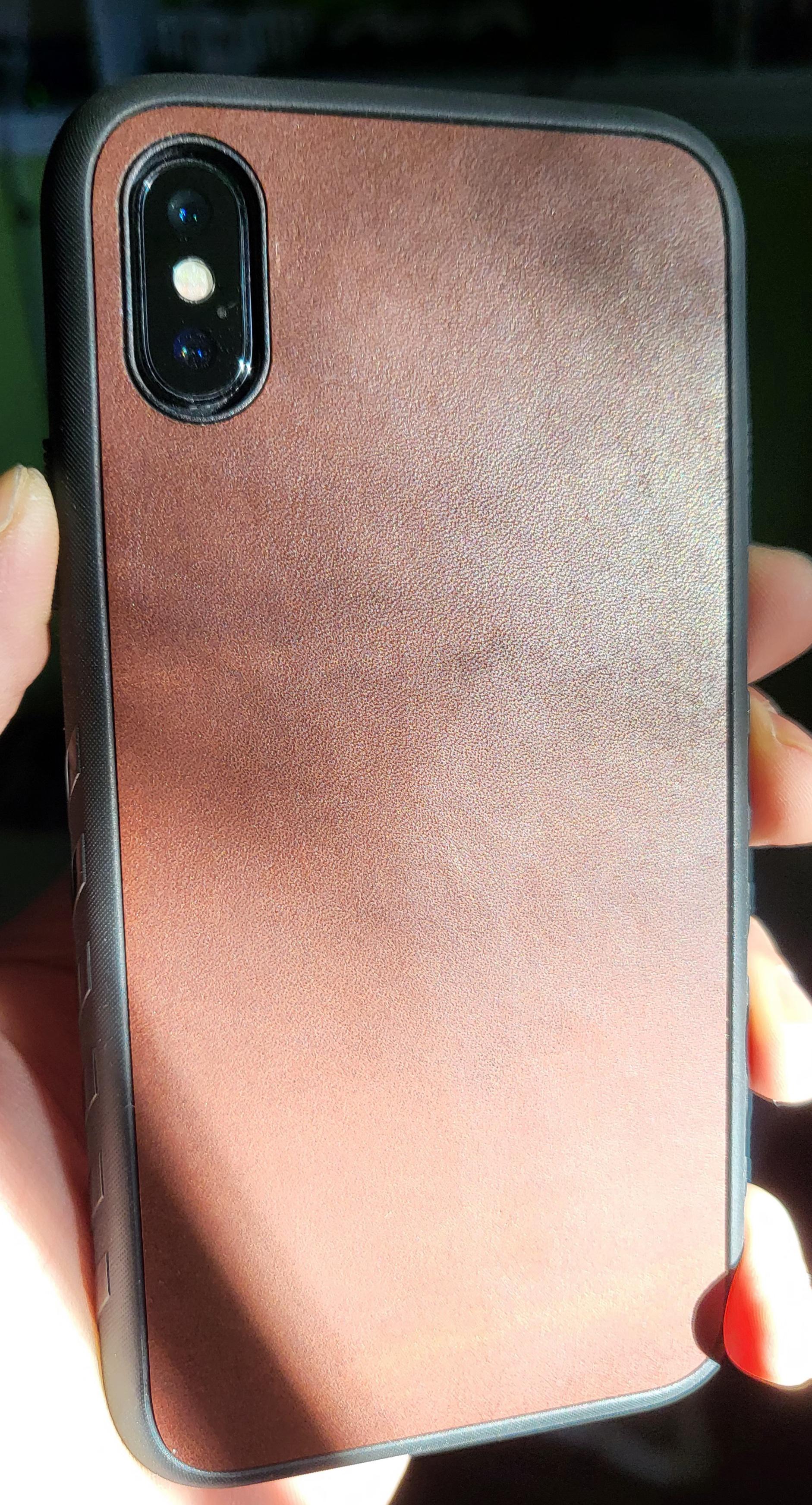 Finally got the iPhone X grip leather skin. To say I'm impressed with