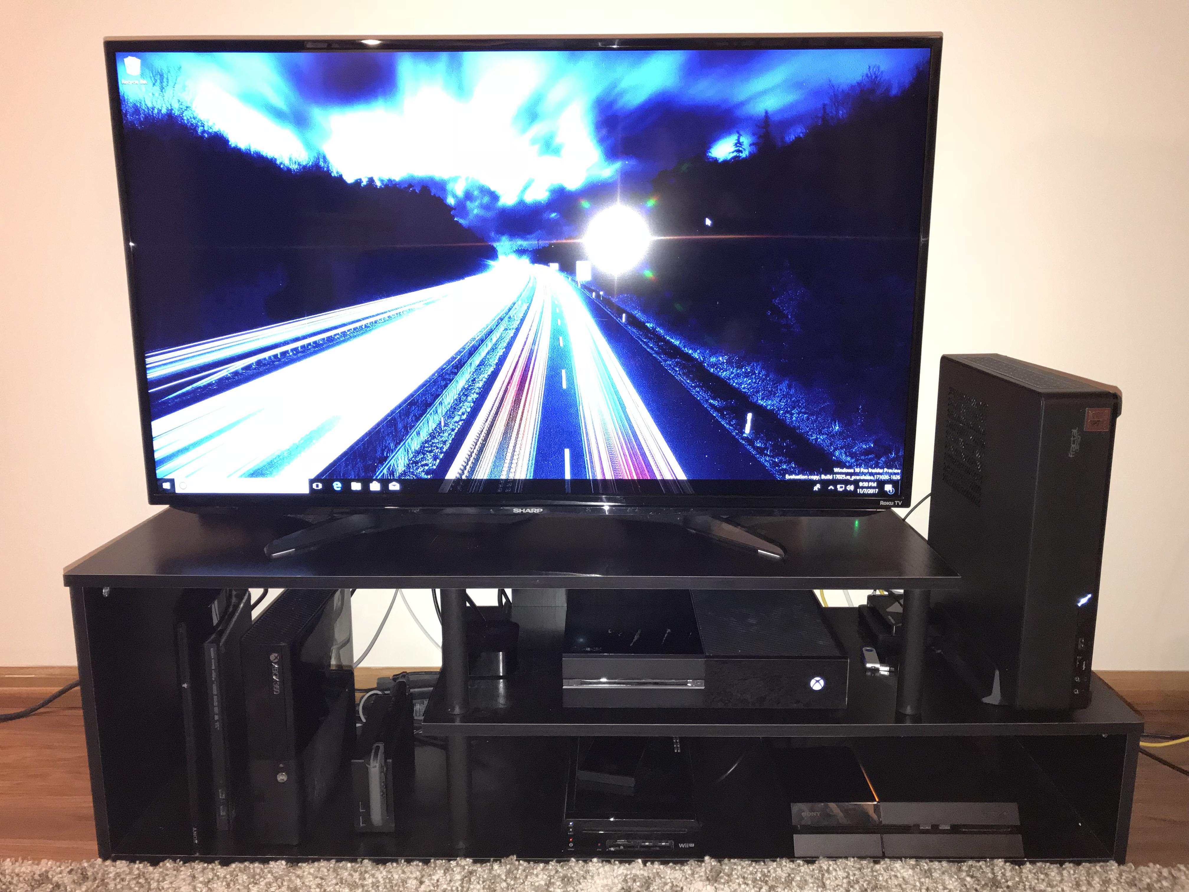 Updated my living room setup with a smaller case for my PC r/pcmasterrace