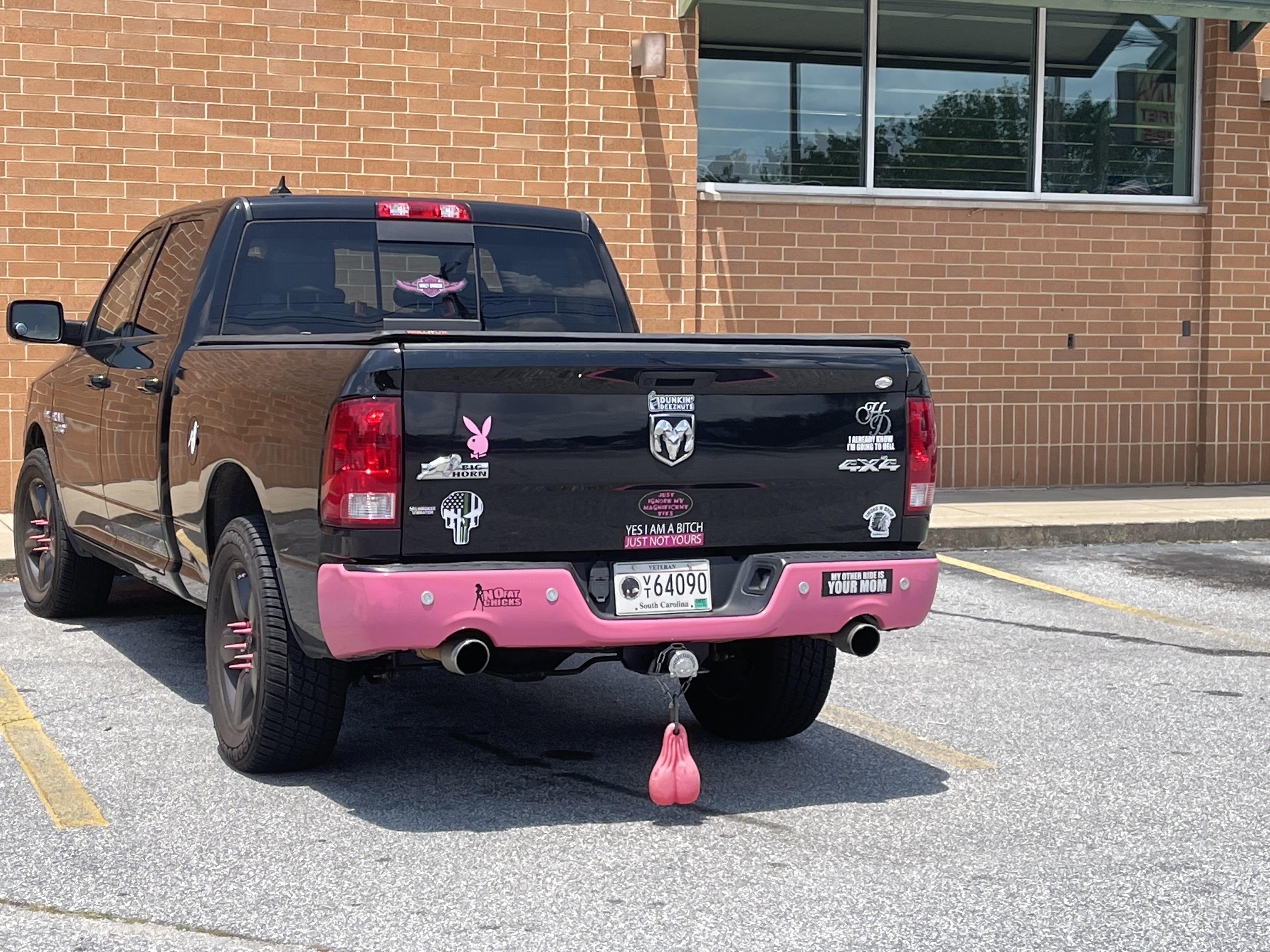 Spotted at the Walgreens, big ol pink truck nuts NymphowarriorRides