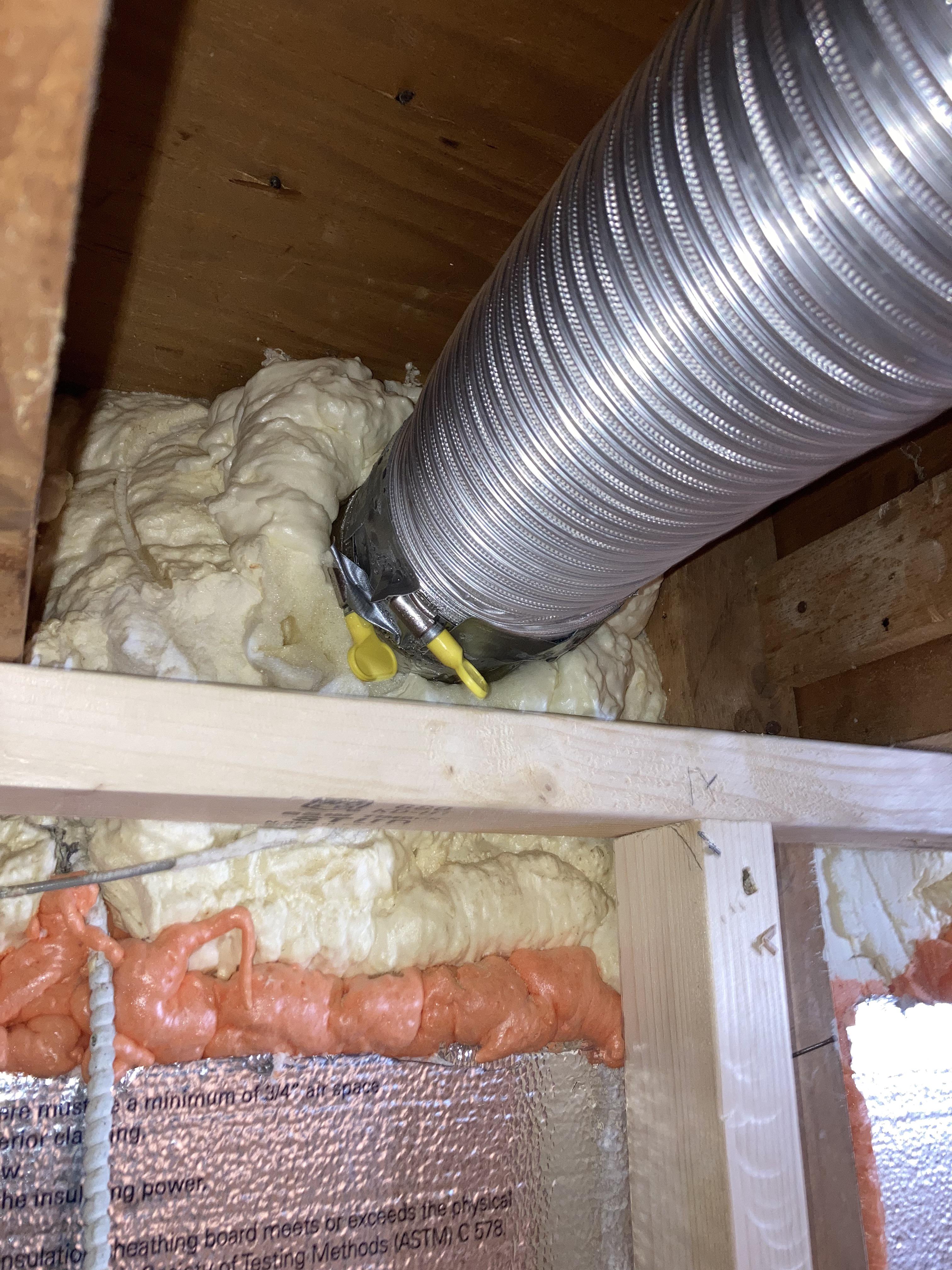 Basement bathroom fan vent. Condensation on the duct (near foam and