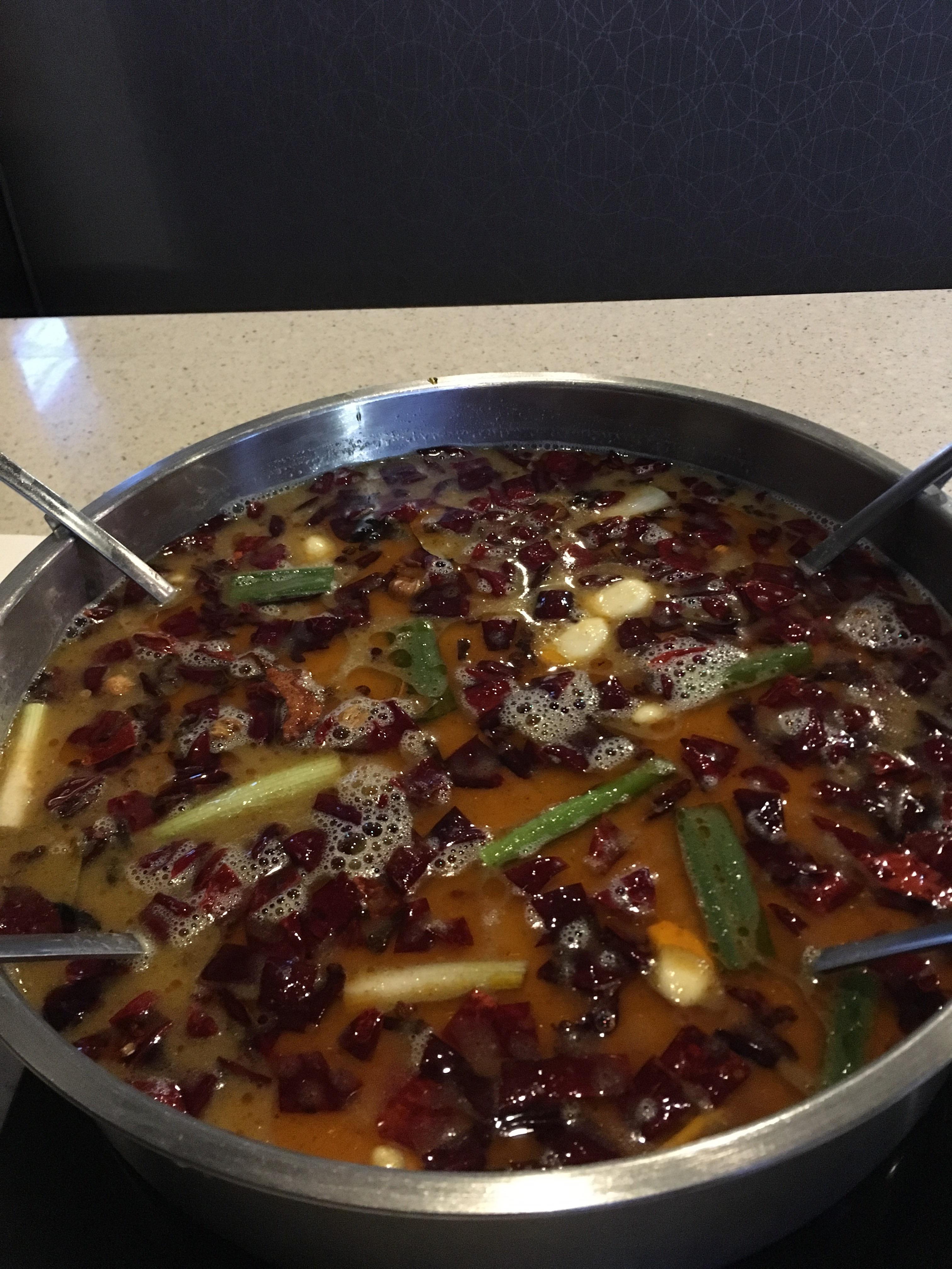 This spicy broth I keep getting at little sheep mongolian hotpot in