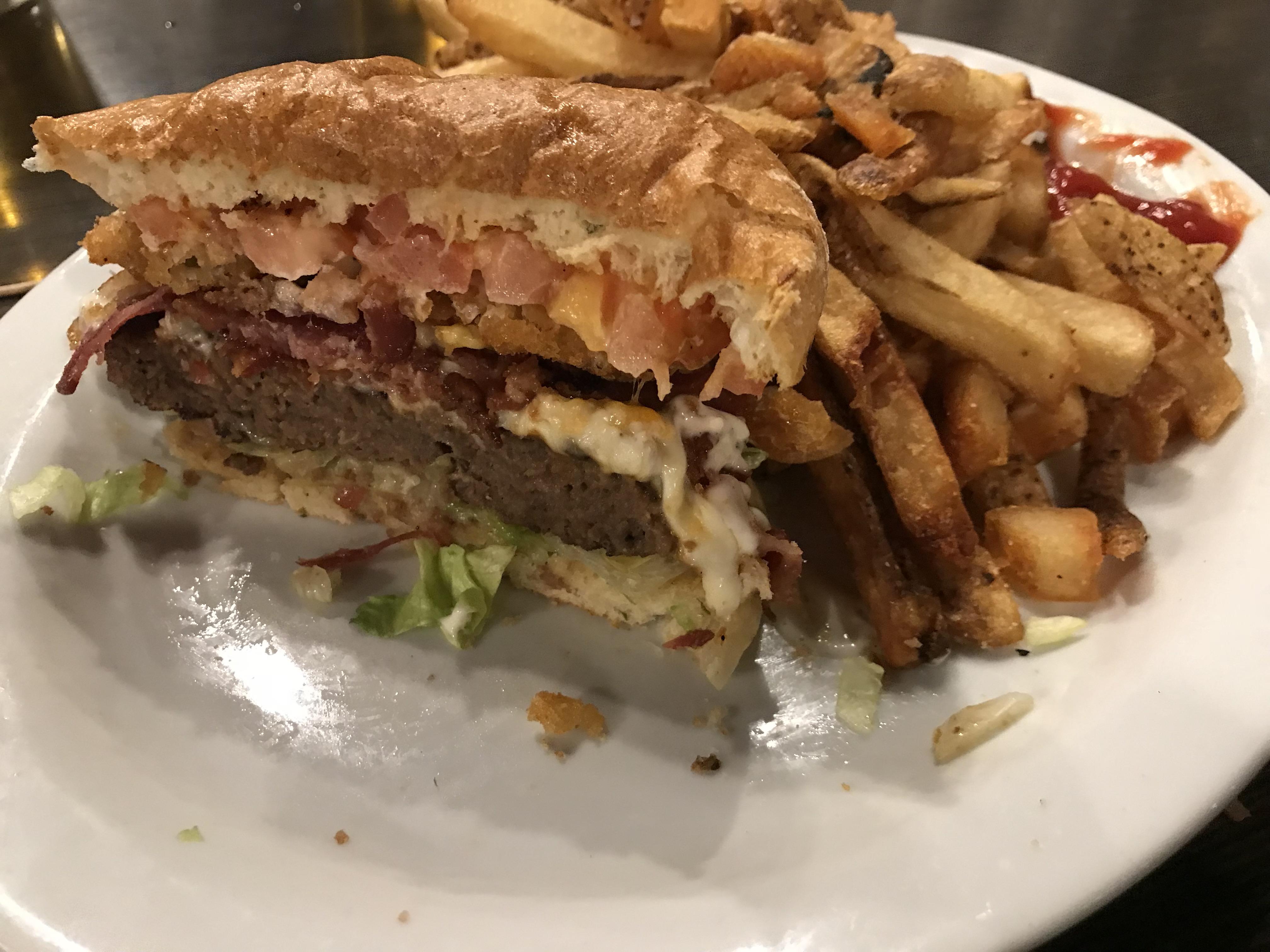 [I ate] This amazing burger with bacon, deep fried pickles and ranch