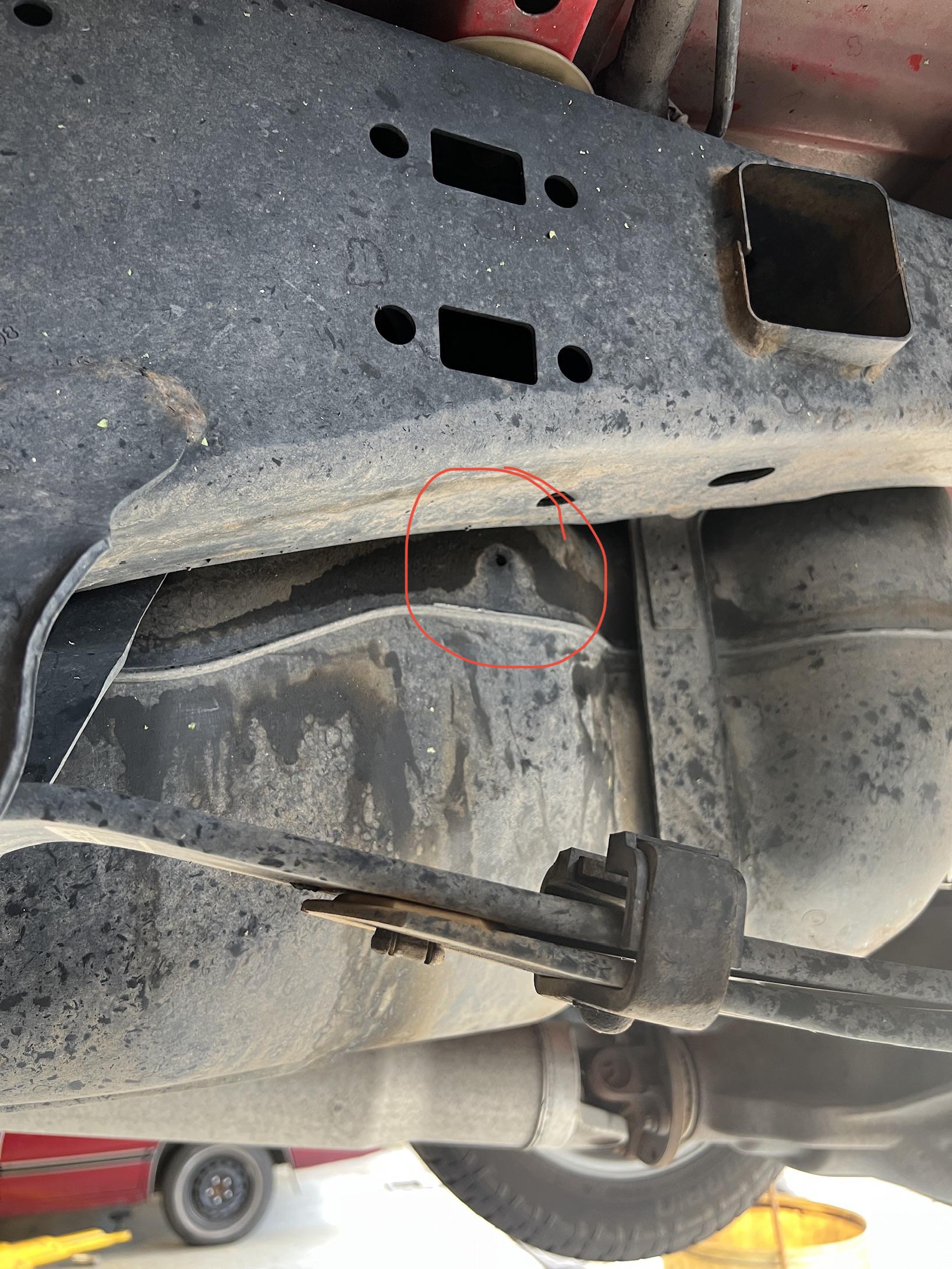 Someone drilled a hole in my gas tank (in a strange spot), did not