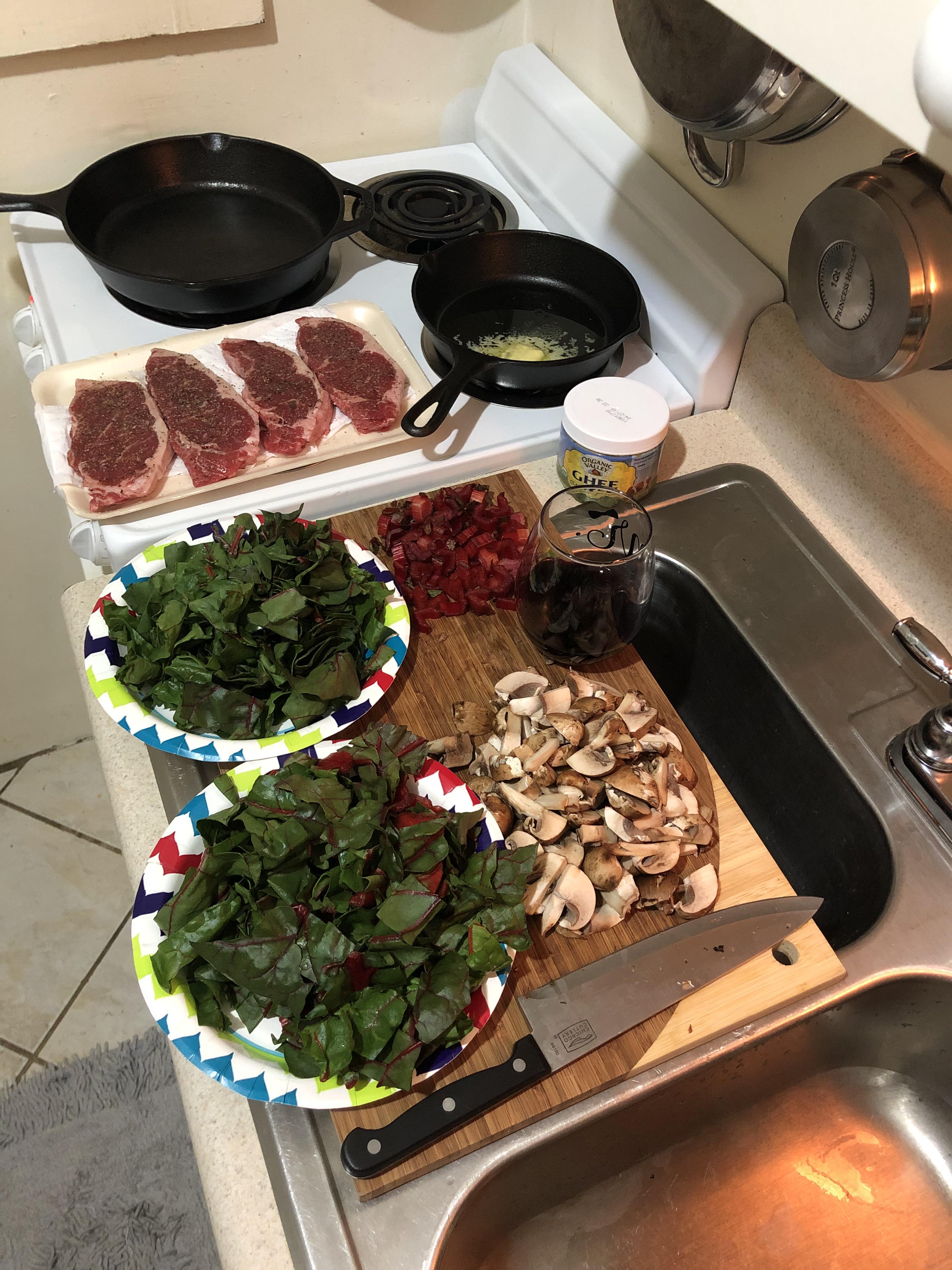 Breakin out the cast iron for strip steaks and sautéed mushrooms and