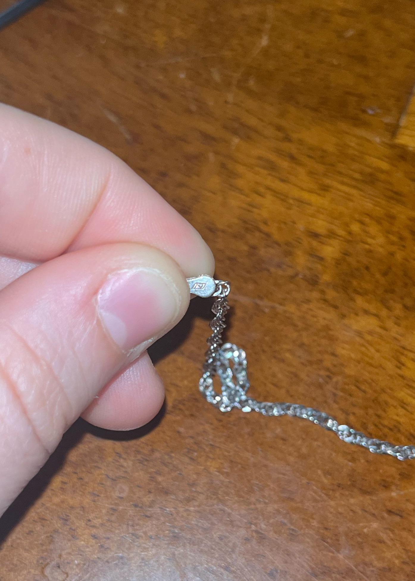 What does an N inside a box stamp mean on jewelry r/jewlerymaking