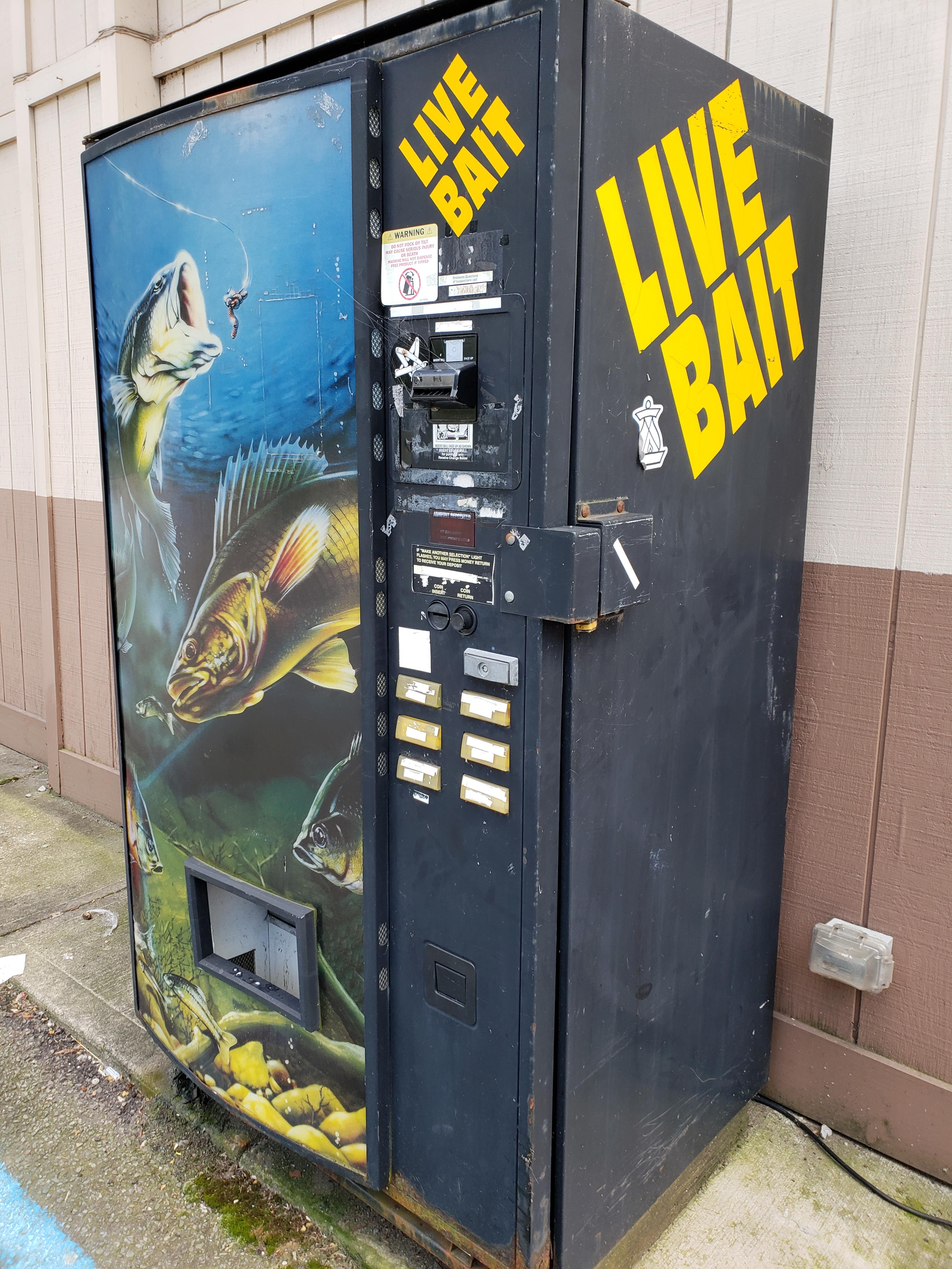 This lakeside gas station has a live bait vending machine r