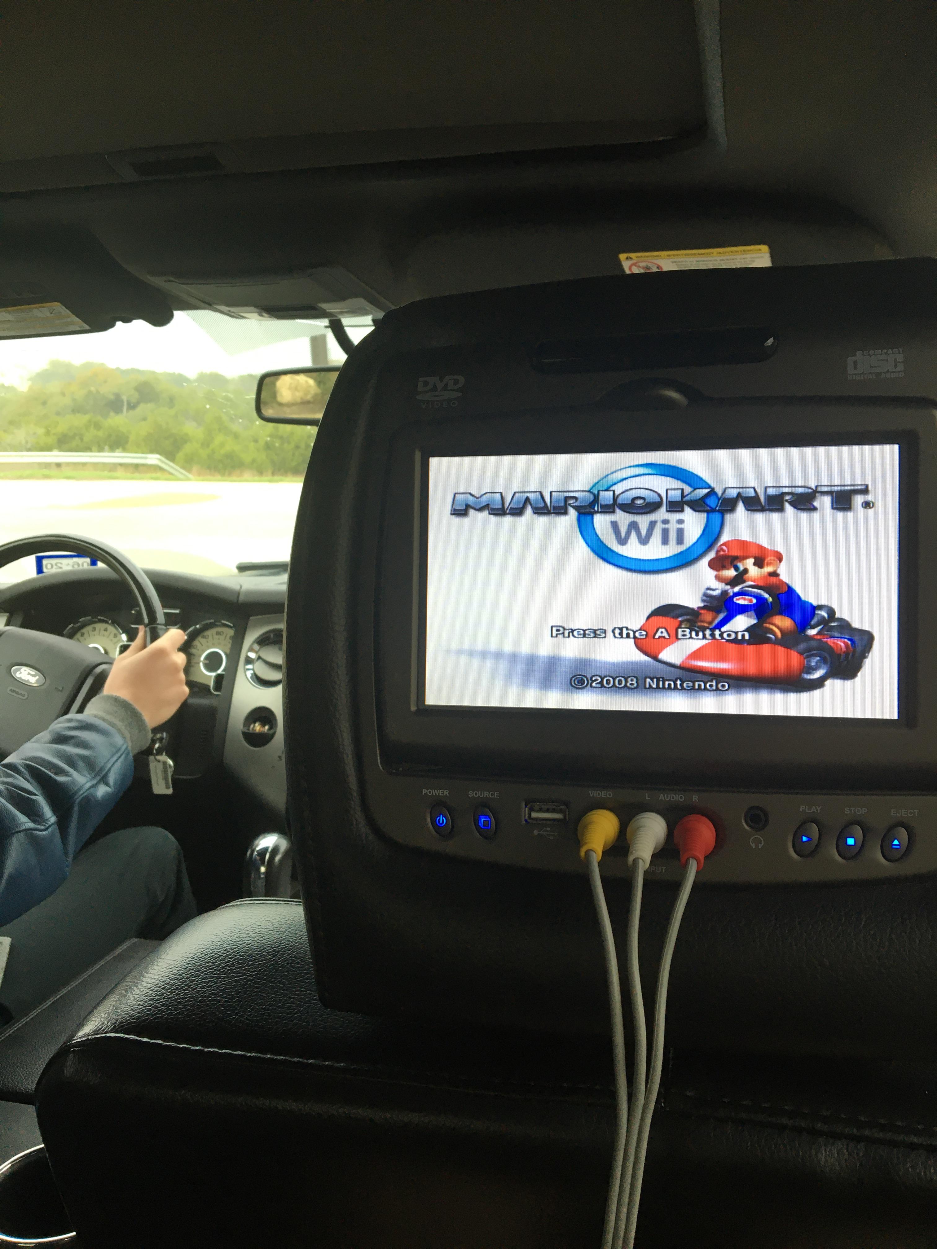 True gamer move. Setup the Wii in my brothers car! r/wii