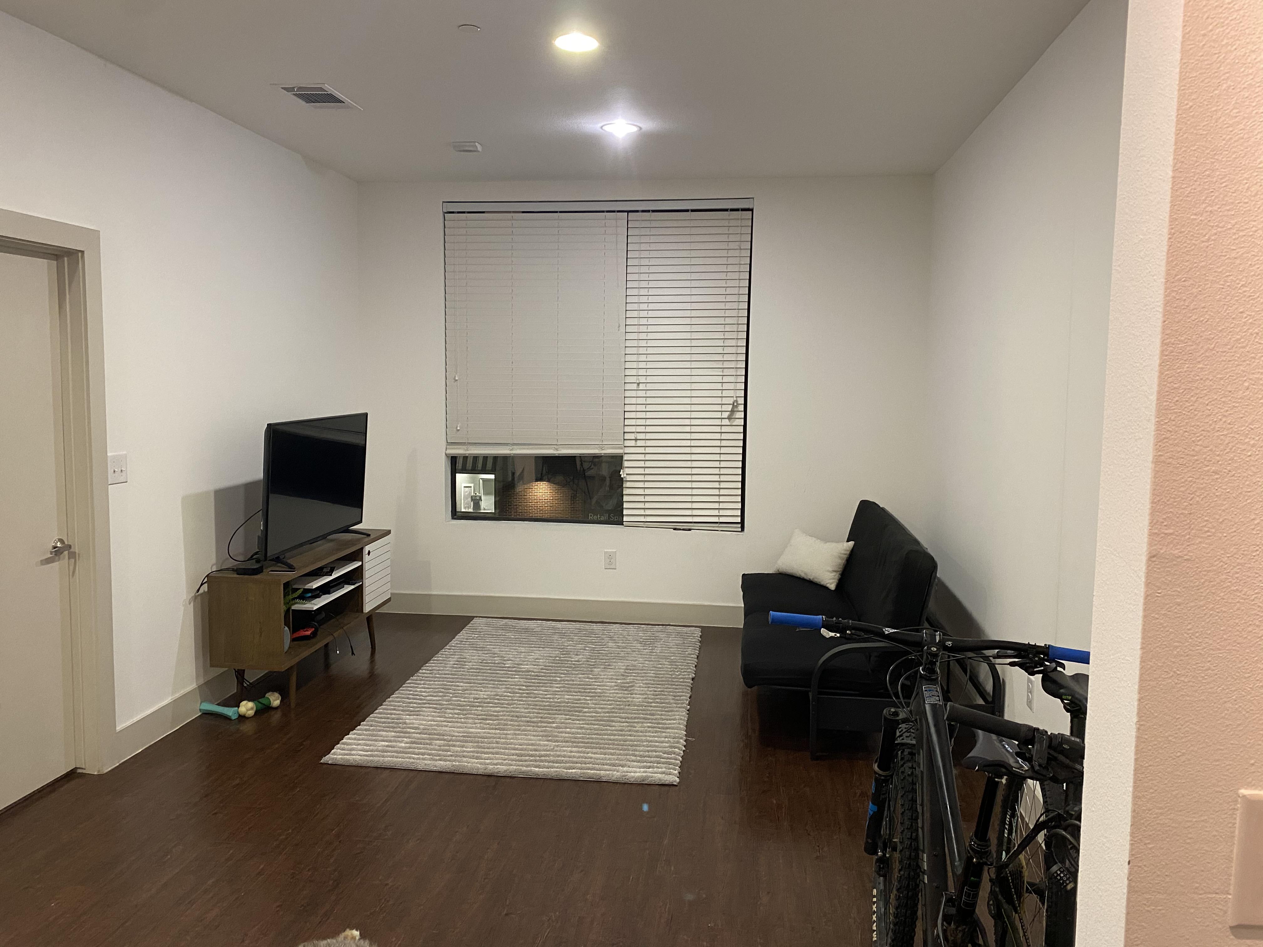 Suggestions on how to improve my living room? Looking to keep the rug