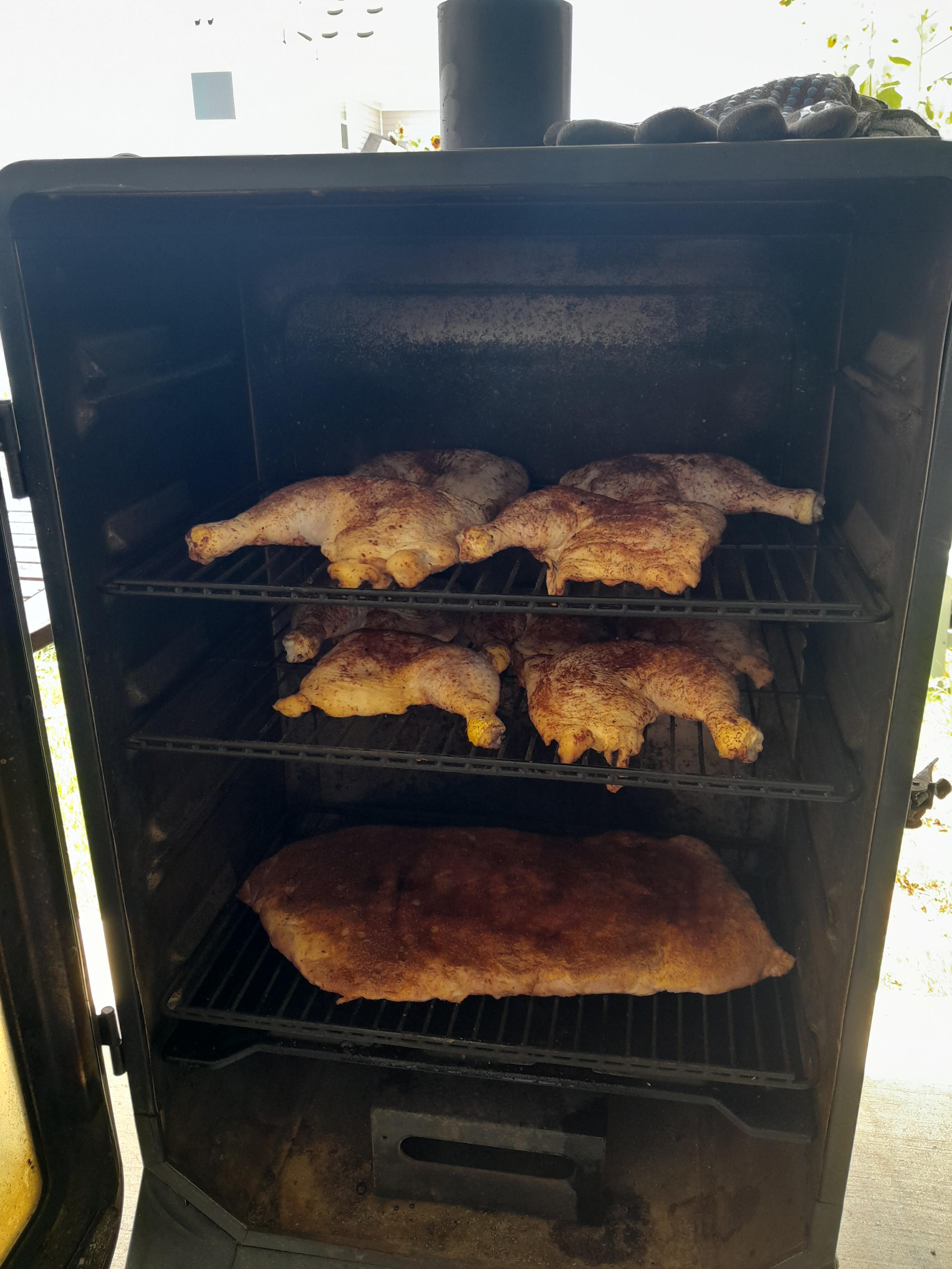 Meal prep Sunday. 5lb rack of spare ribs and 10lb of chicken leg quarters for under 11. Smoking