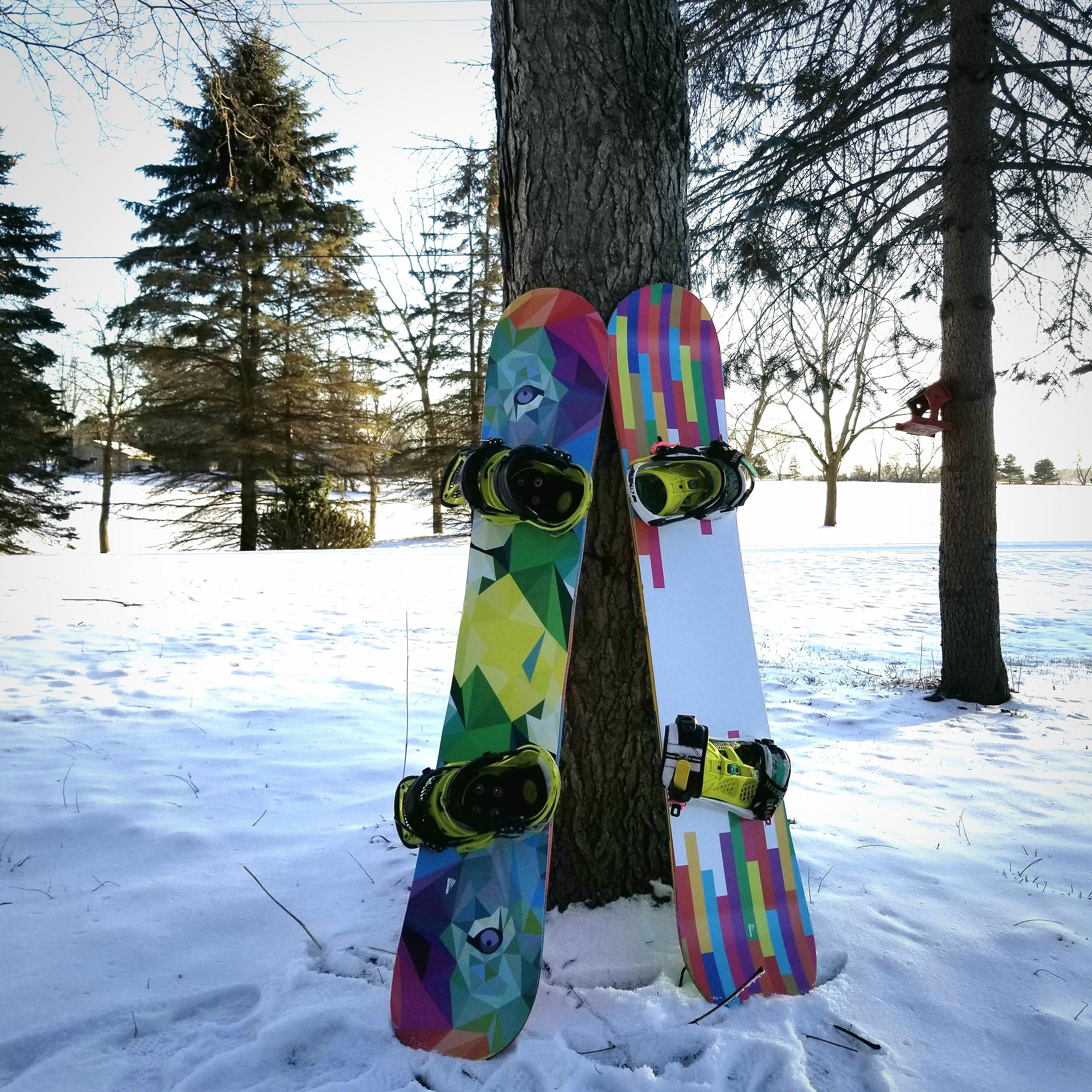 I design vinyl wraps for snowboards. Here are a couple I did for my