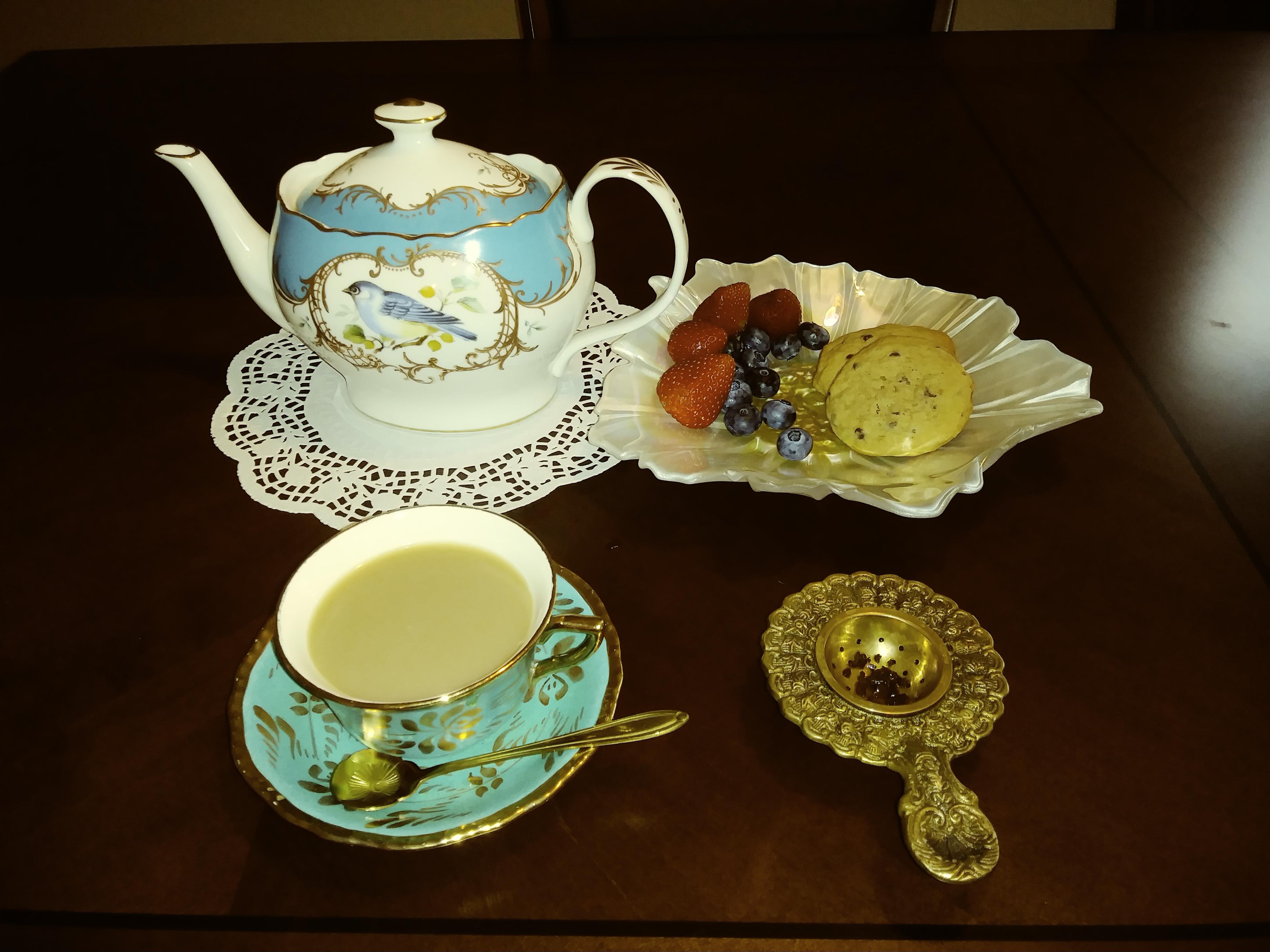 Birthday cake black tea from a local tea shop with milk and sugar with