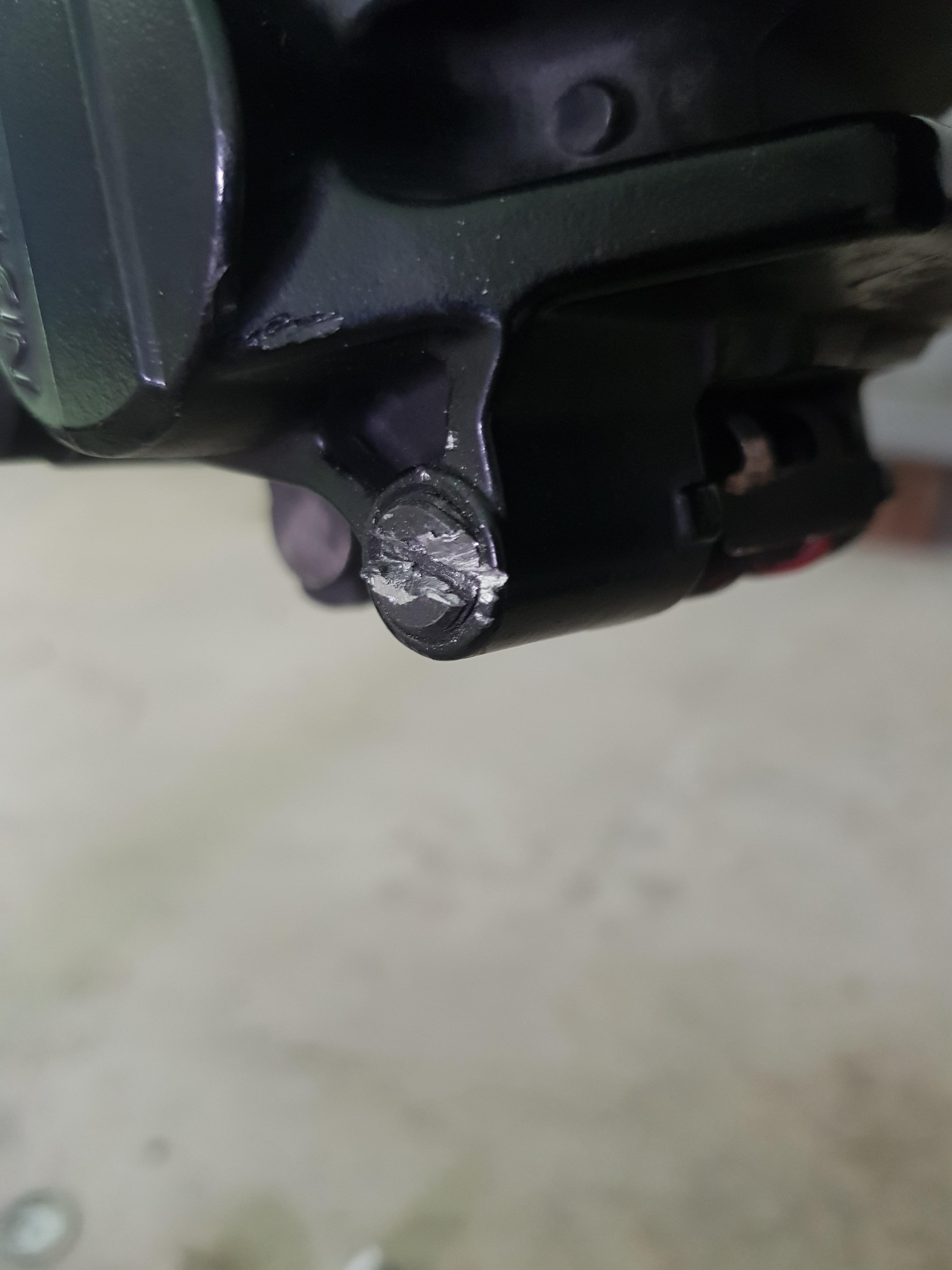 Any idea how I can remove this stuck slide pin? The threads are on the