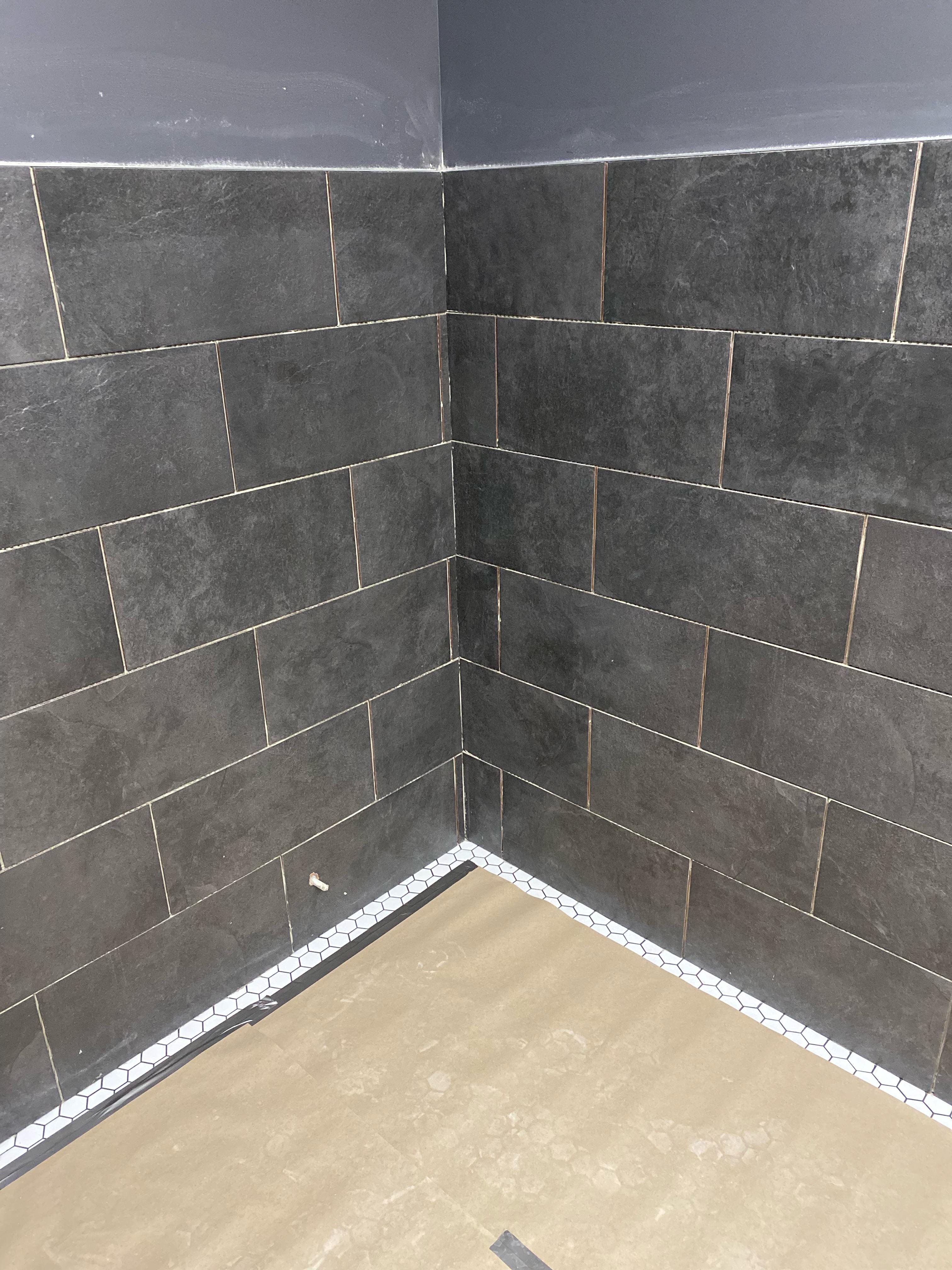 Change of plane. Should I caulk these corners and where the floor meets the wall with a color