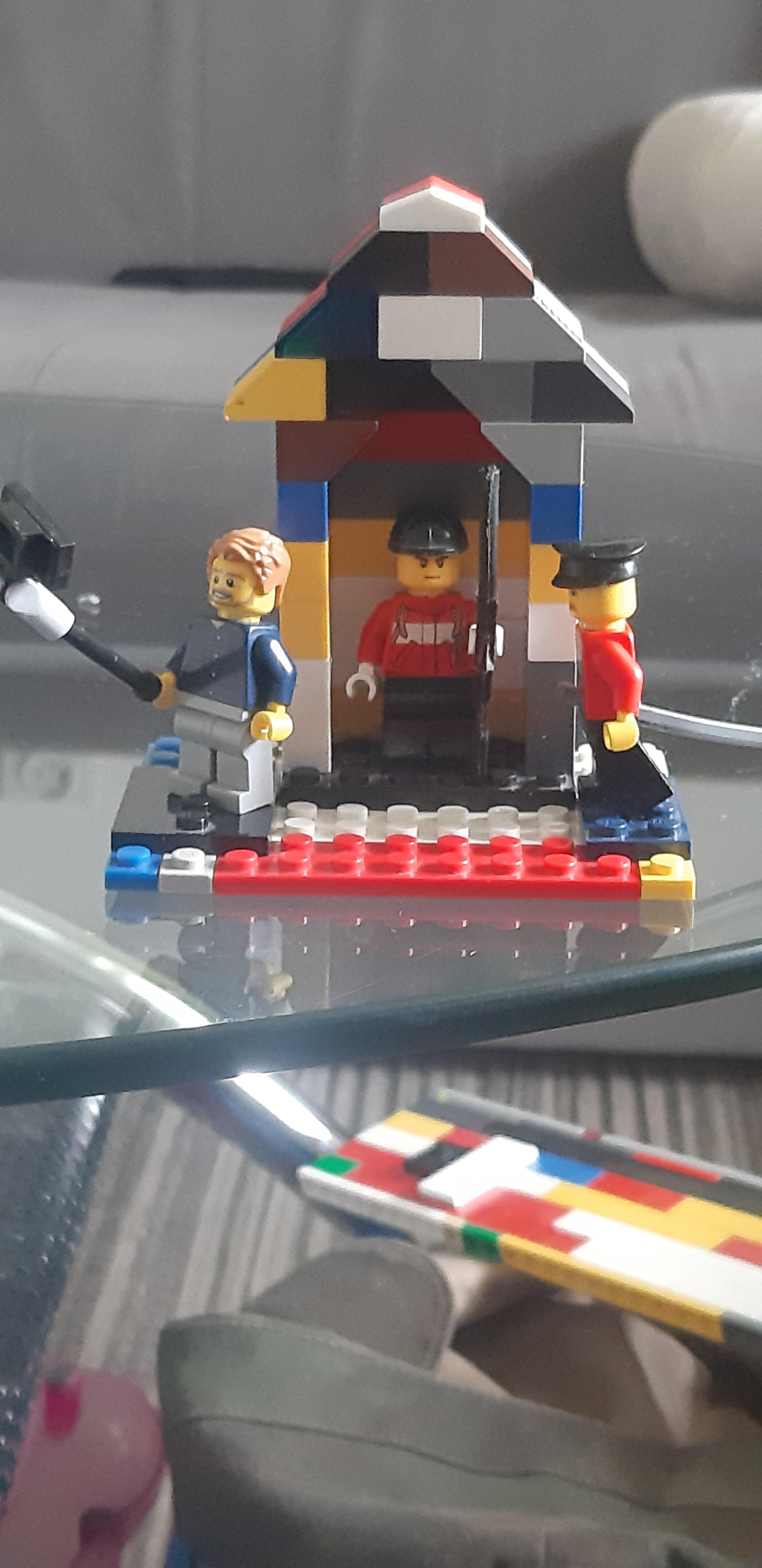 Upgraded LEGO royal guard grenadier I made a yesterday. I added one of those huts that they use