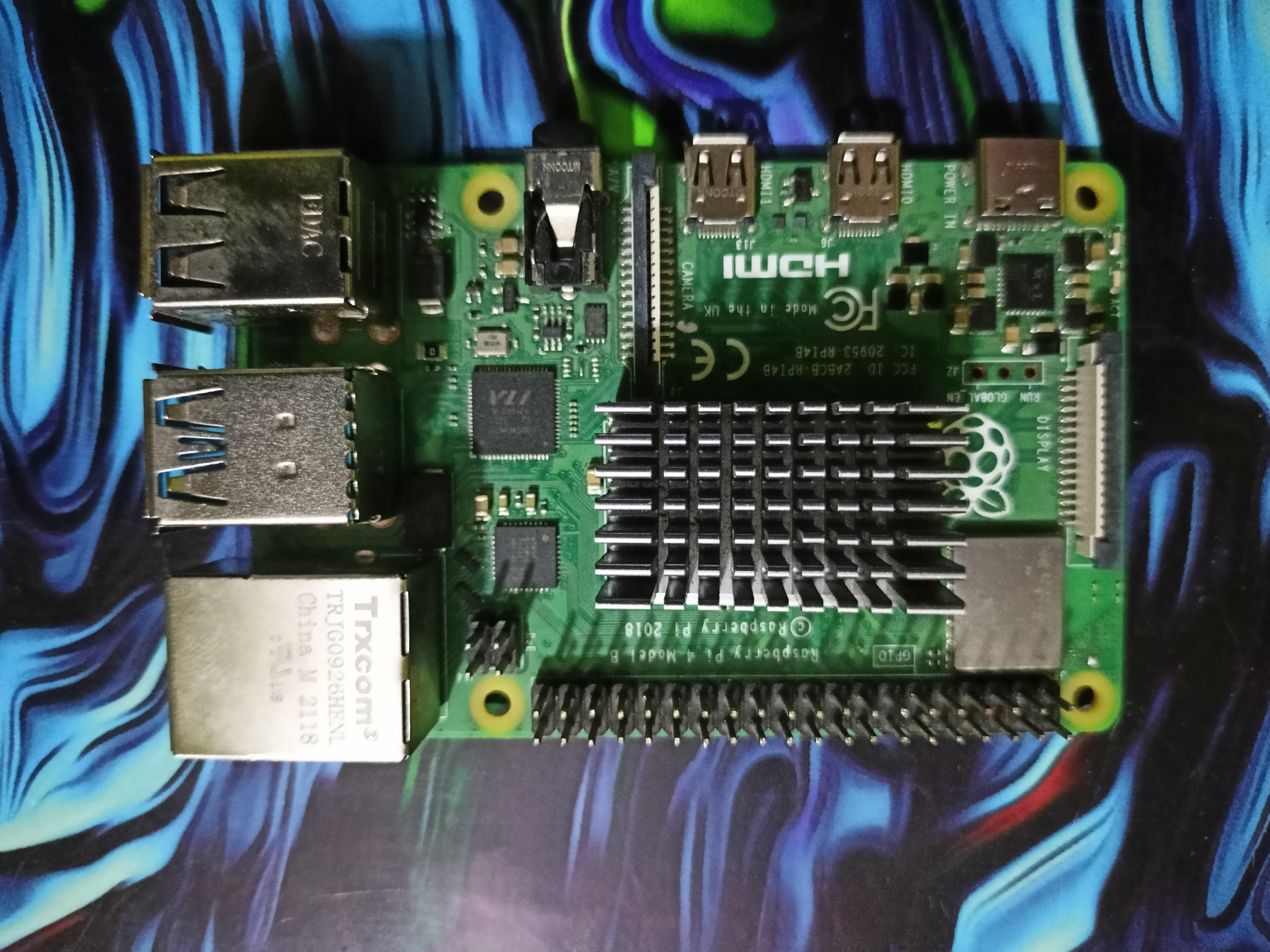 Motherboard north bridge heatsink + RPi4B. Temp dropped from 72°C to 55