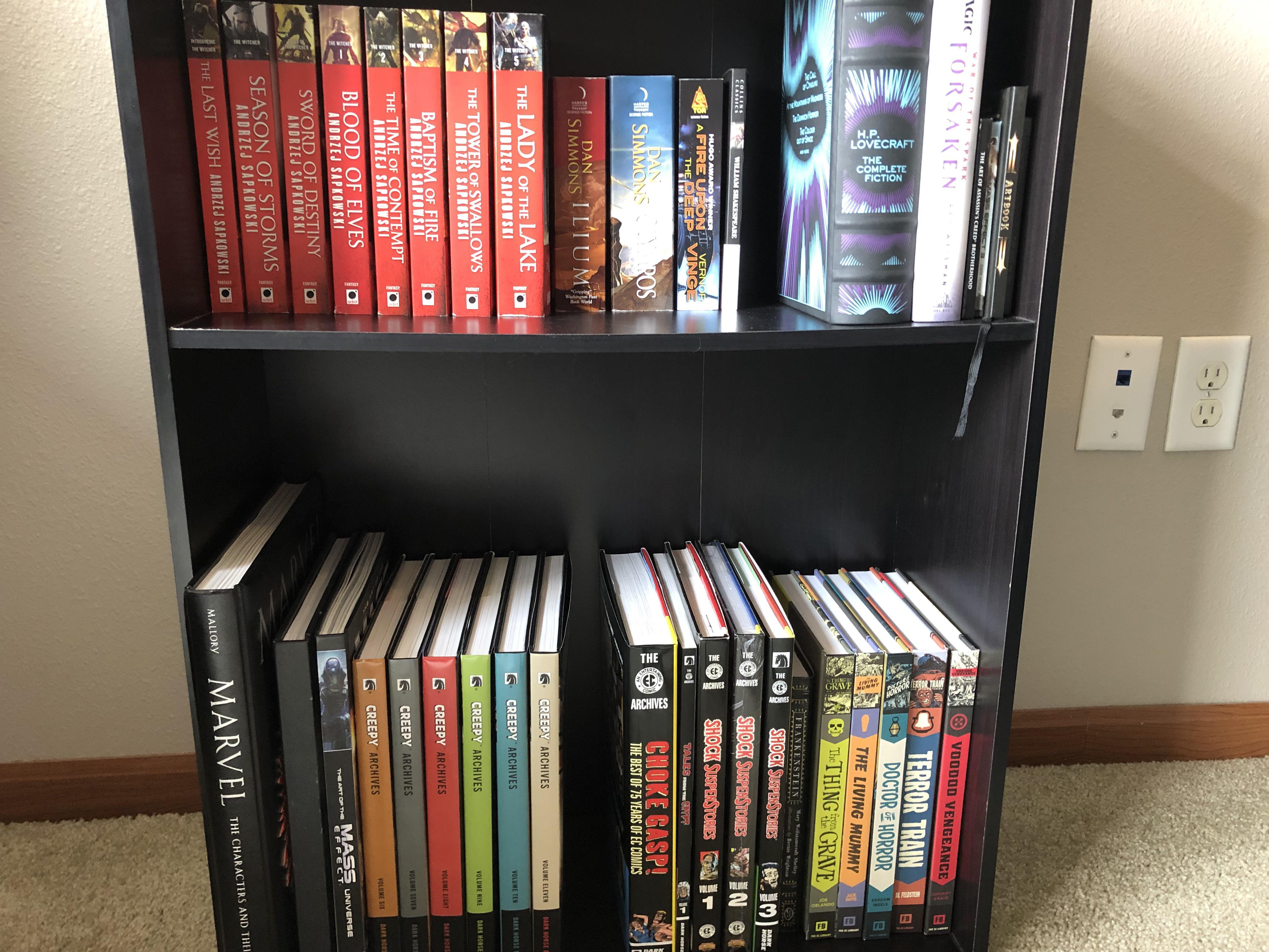 One of the comic book shelves in the office. comicbookshelves