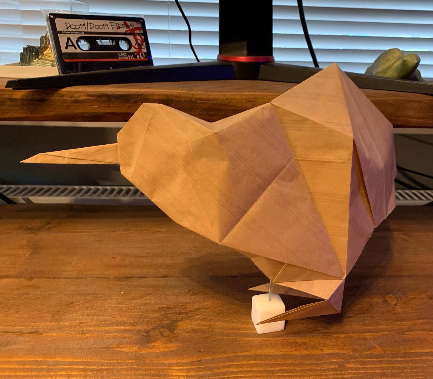 Kiwi designed by Gen Hagiwara and folded by me. I used a 50cm sheet so