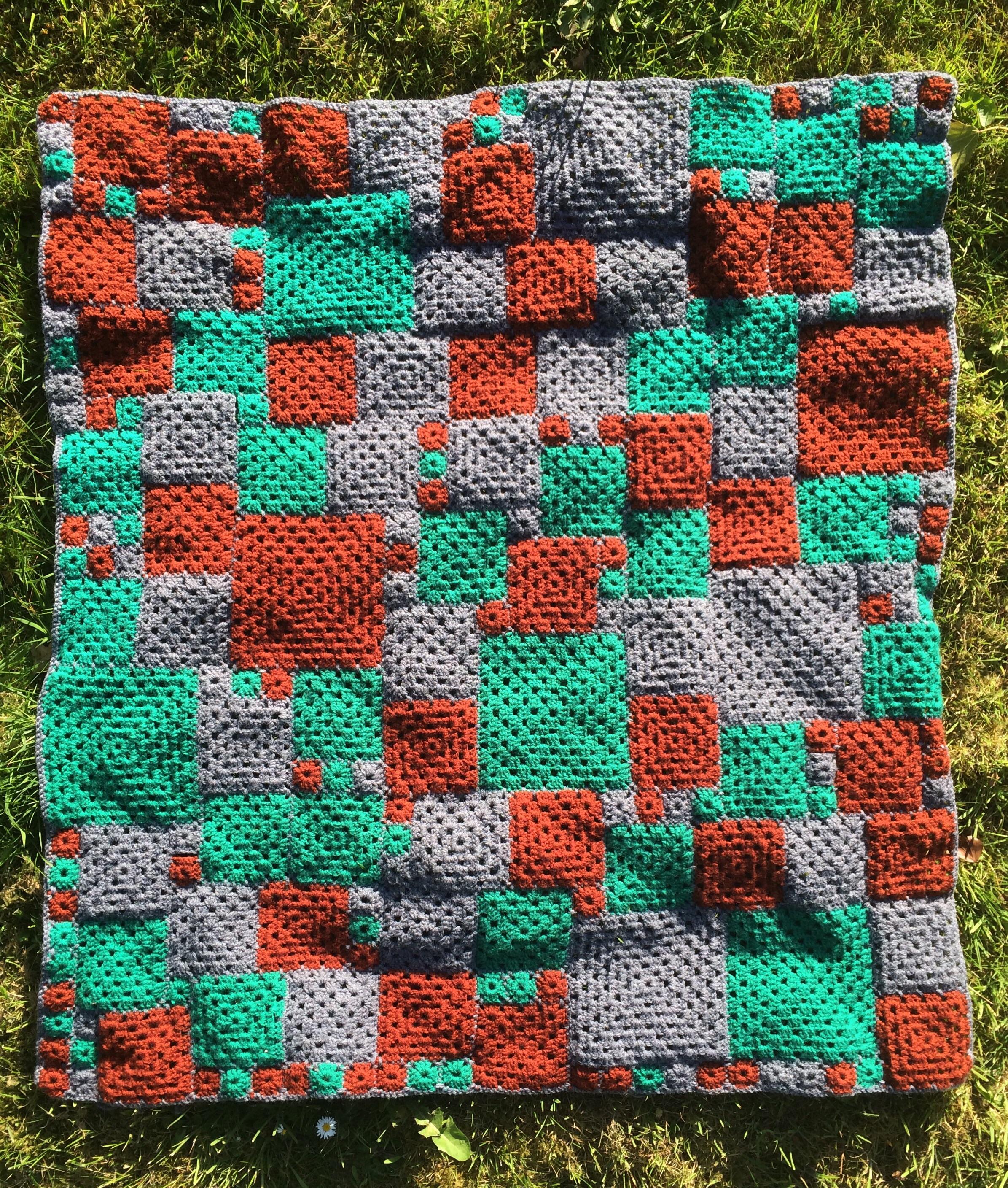 Puzzle blanket is at last complete. crochet