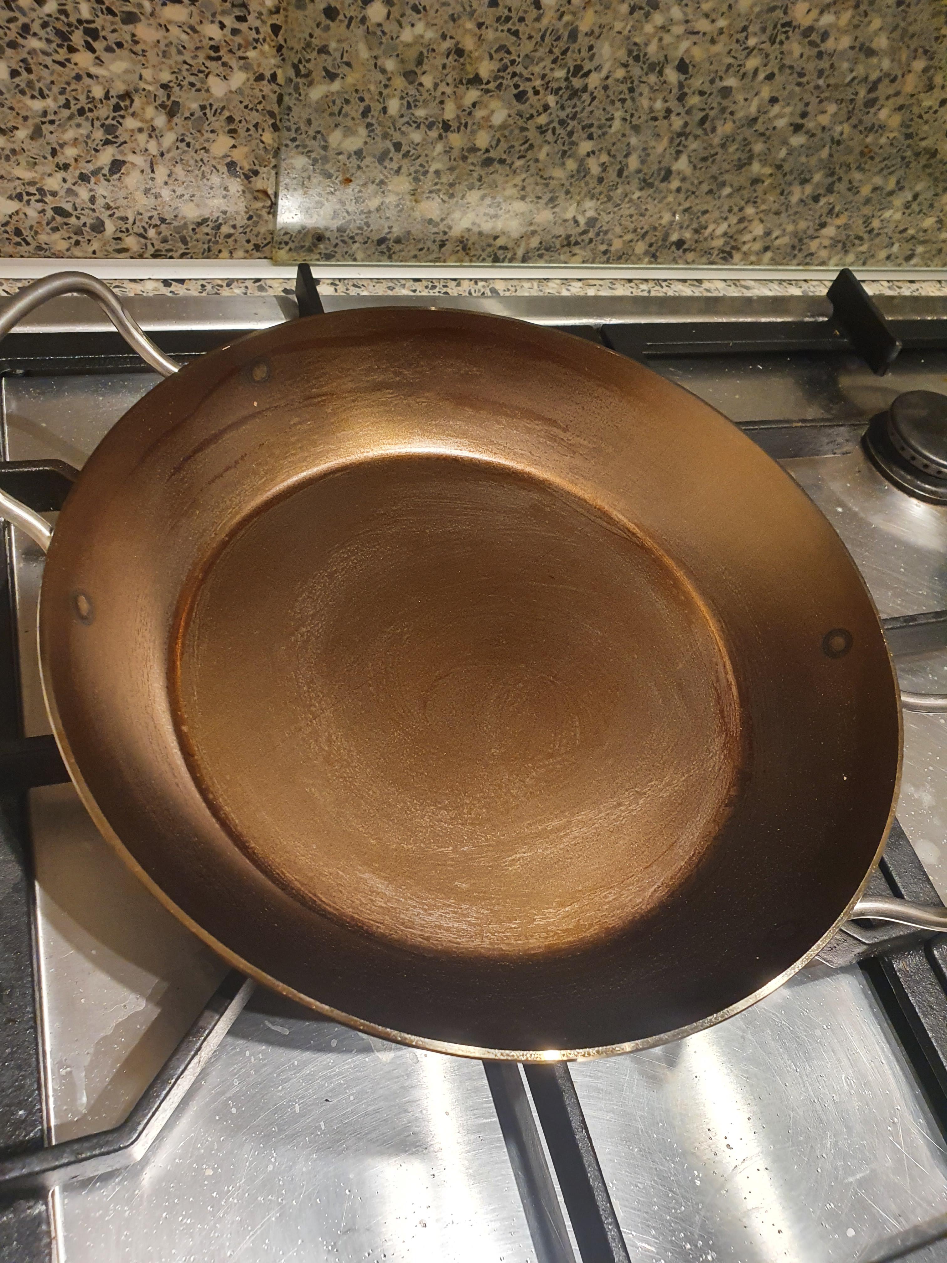 First time CS Pan, seasoned with peanut oil but feels a bit sticky