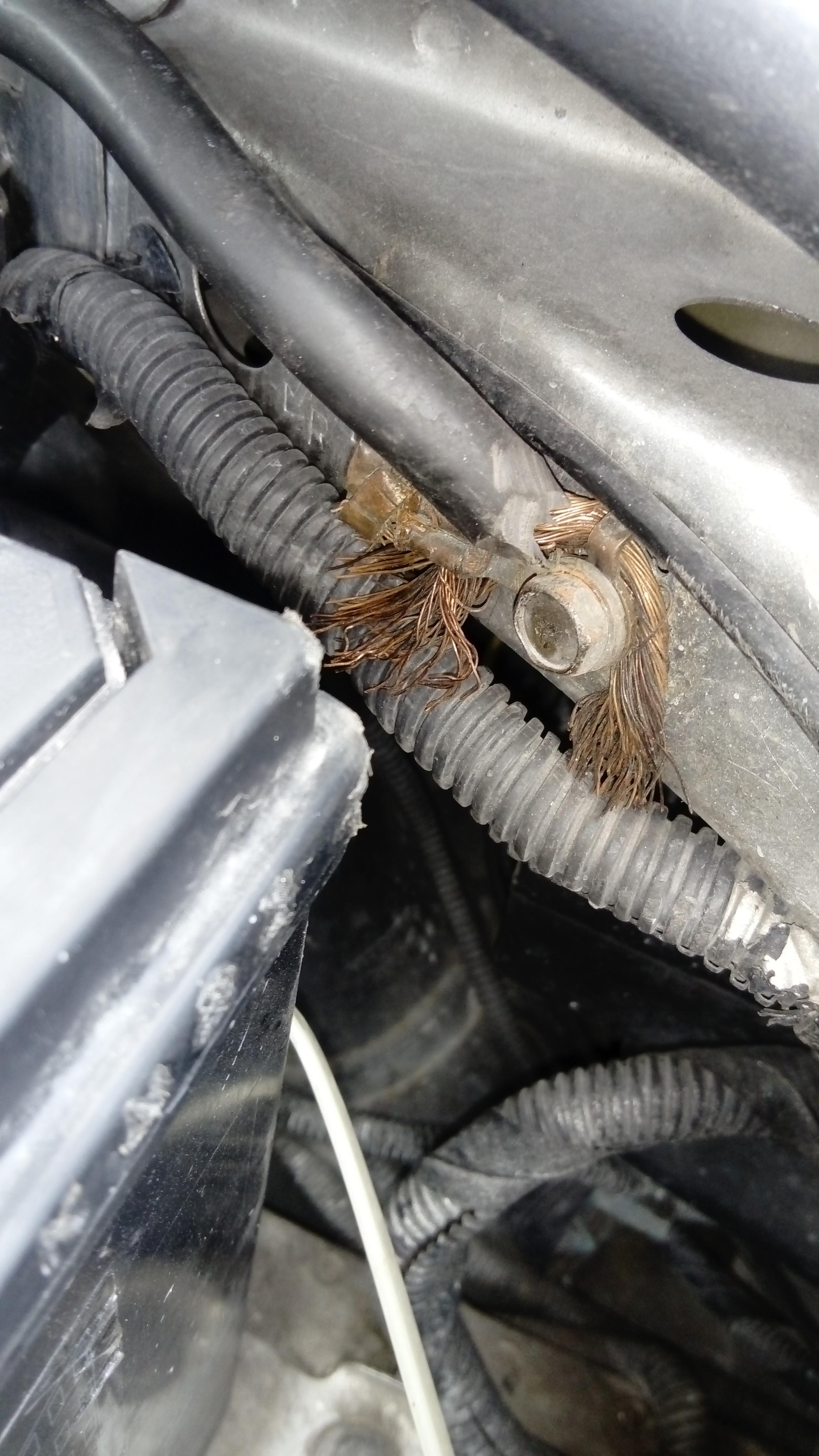 What's wrong here? Something about how the wire for the negative battery terminal is grounded is