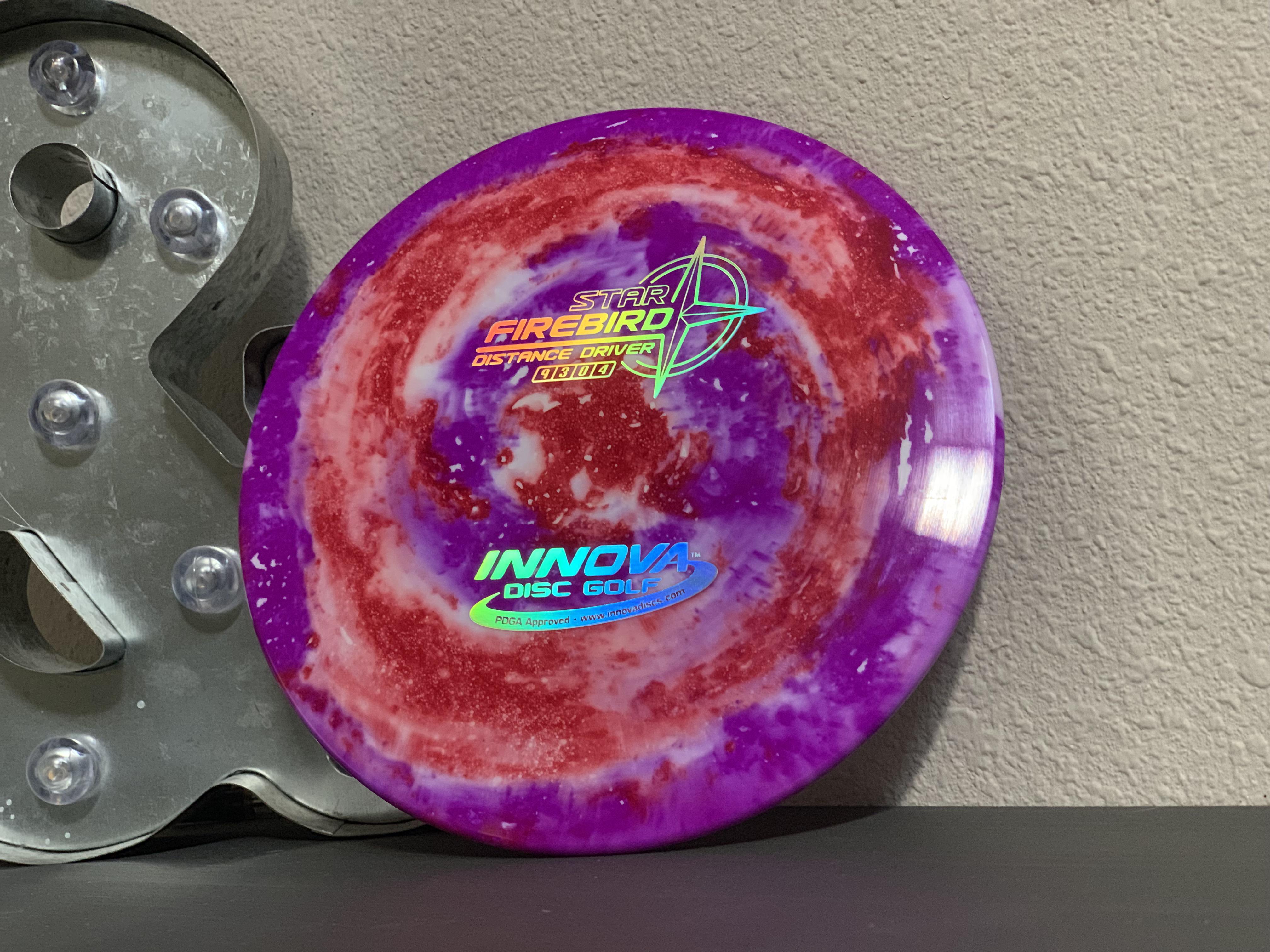Disc golf disc being dyed custom galaxy colors... r/mildlyinteresting