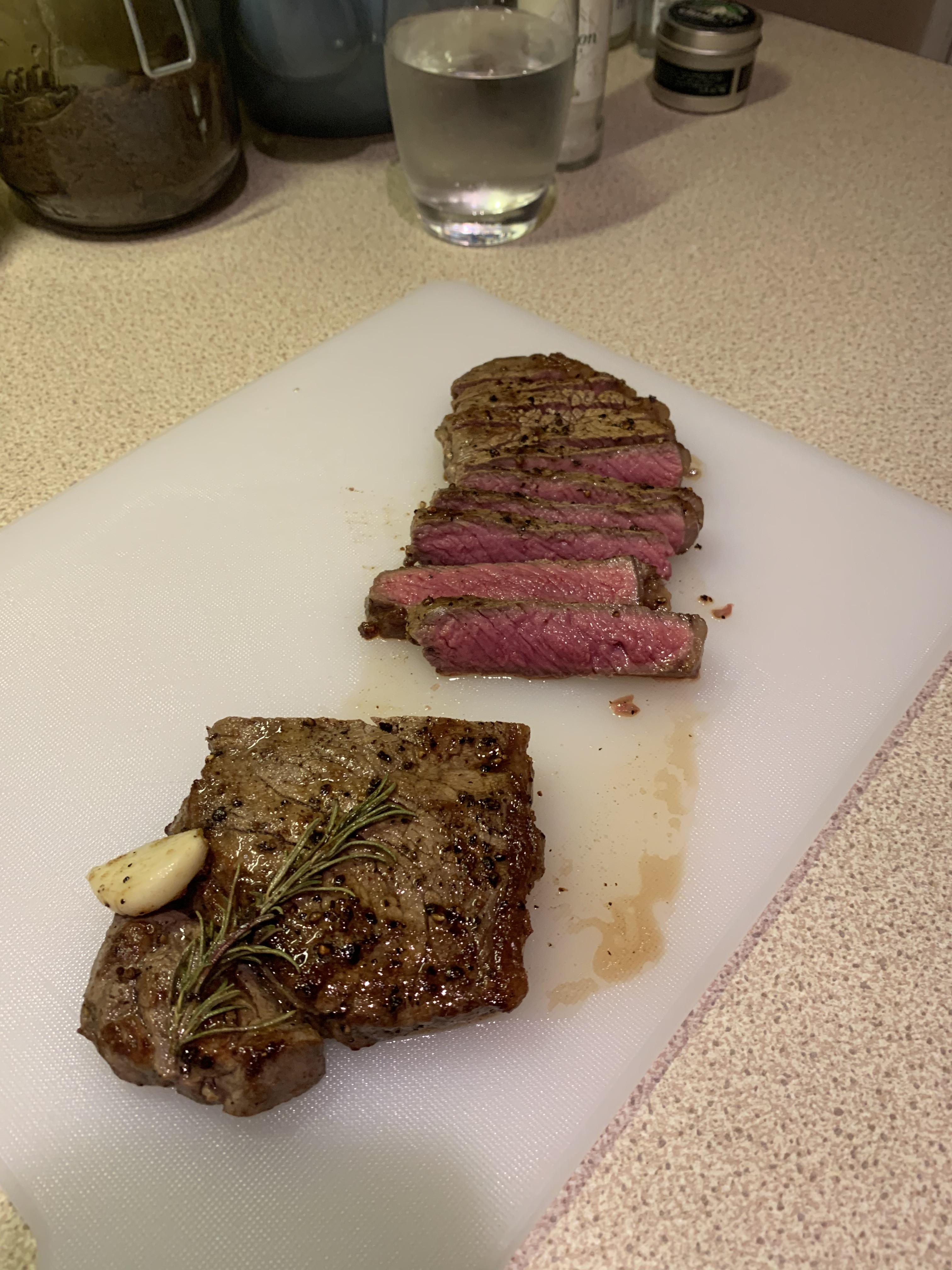 [Homemade] sirloin steak with rosemary and garlic and plenty of butter