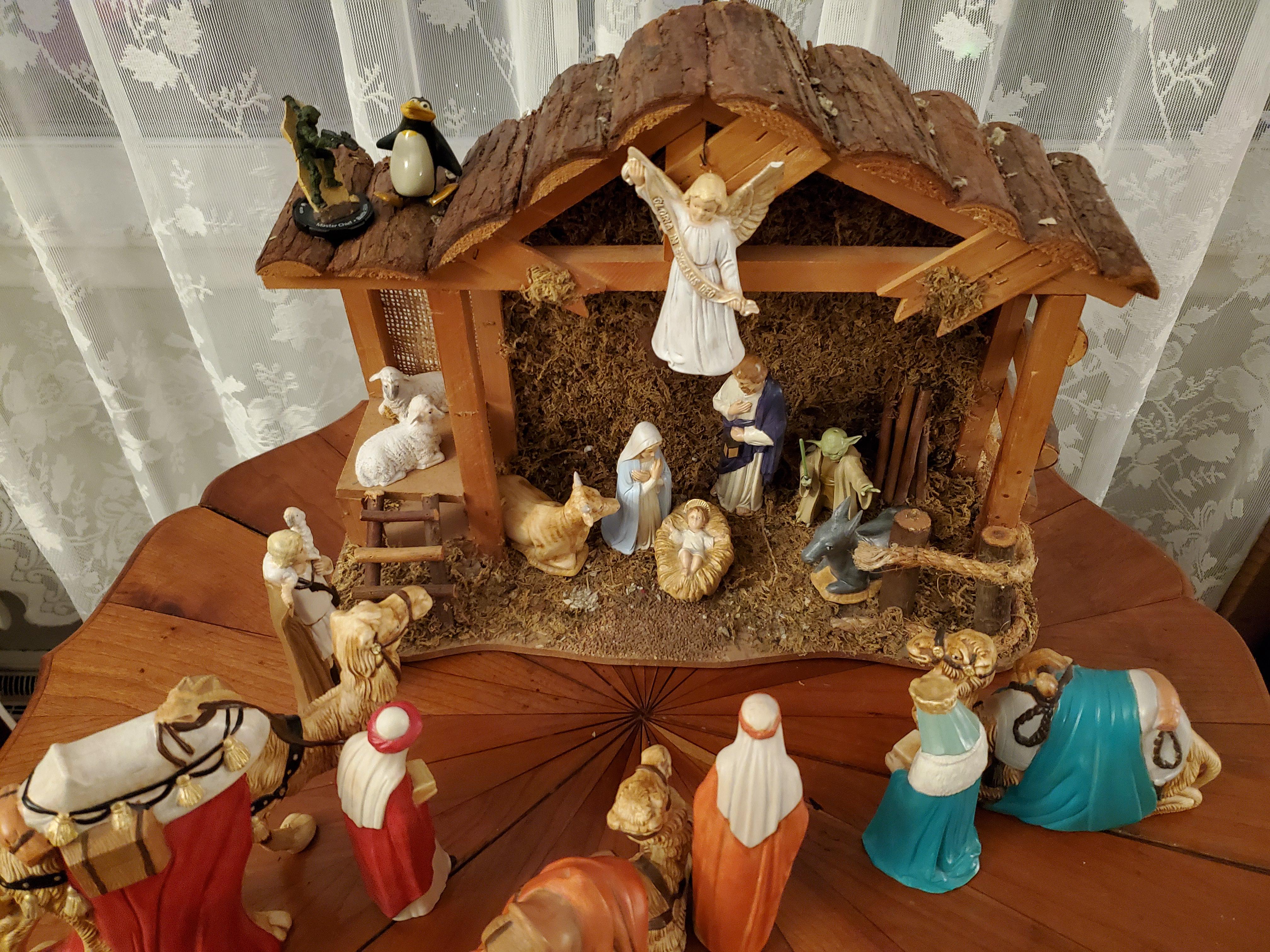 Our nativity scene includes Yoda, Master Chief and a penguin. r