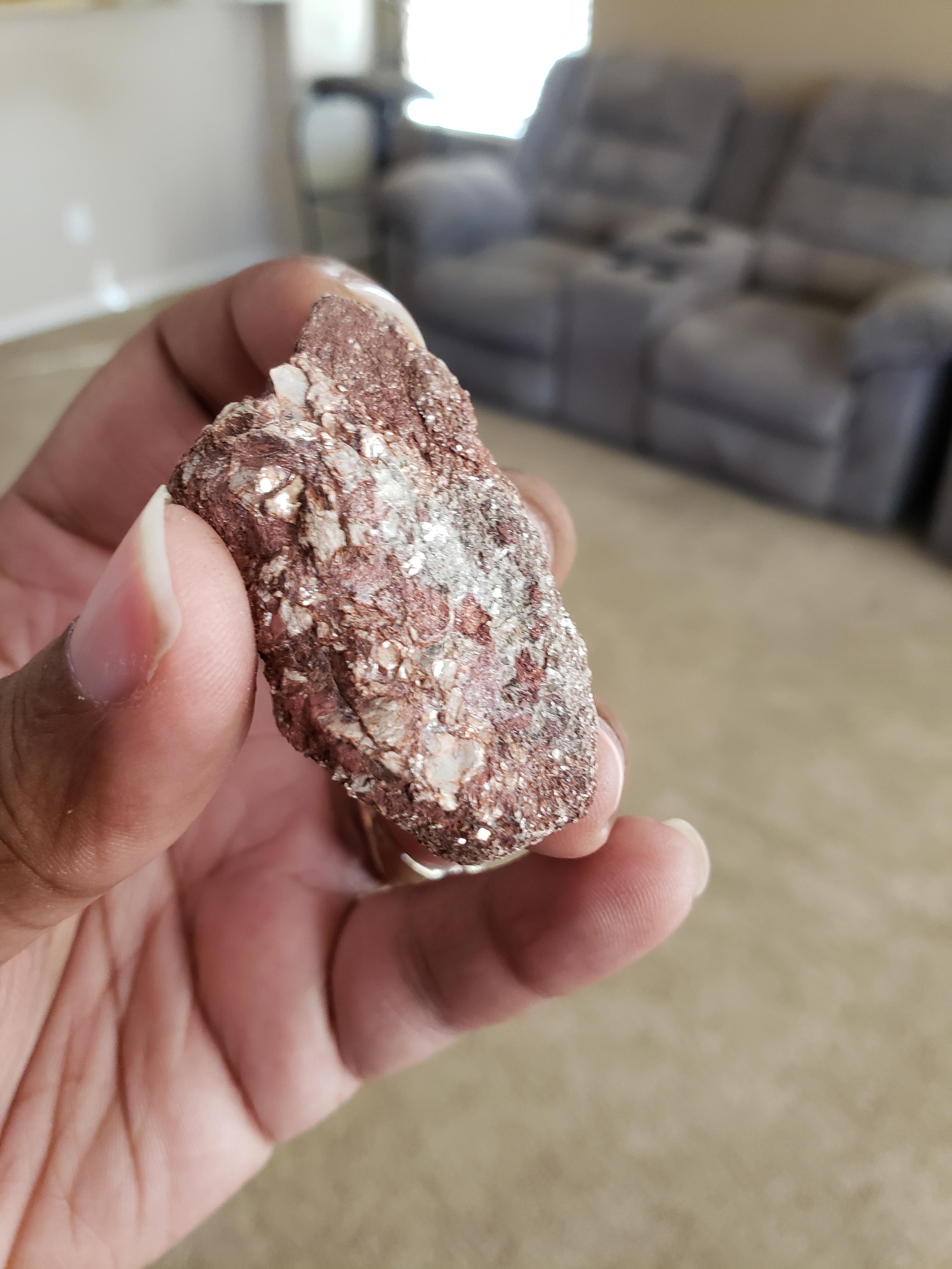 Any idea on what this rock is? A ton of clear and silver sparkly chunks