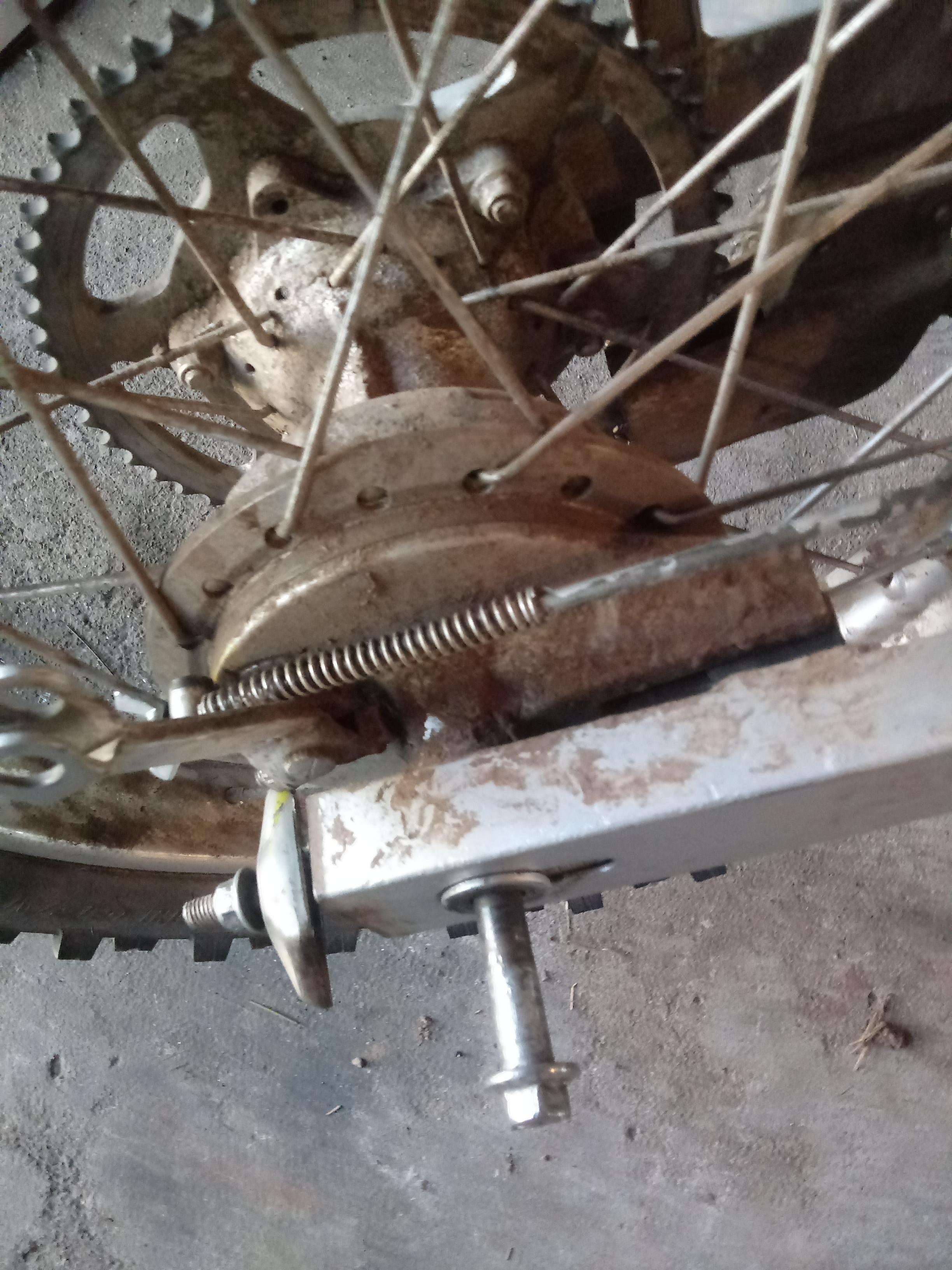 Help how do I get the axle out of my bike it's stuck and wont go any